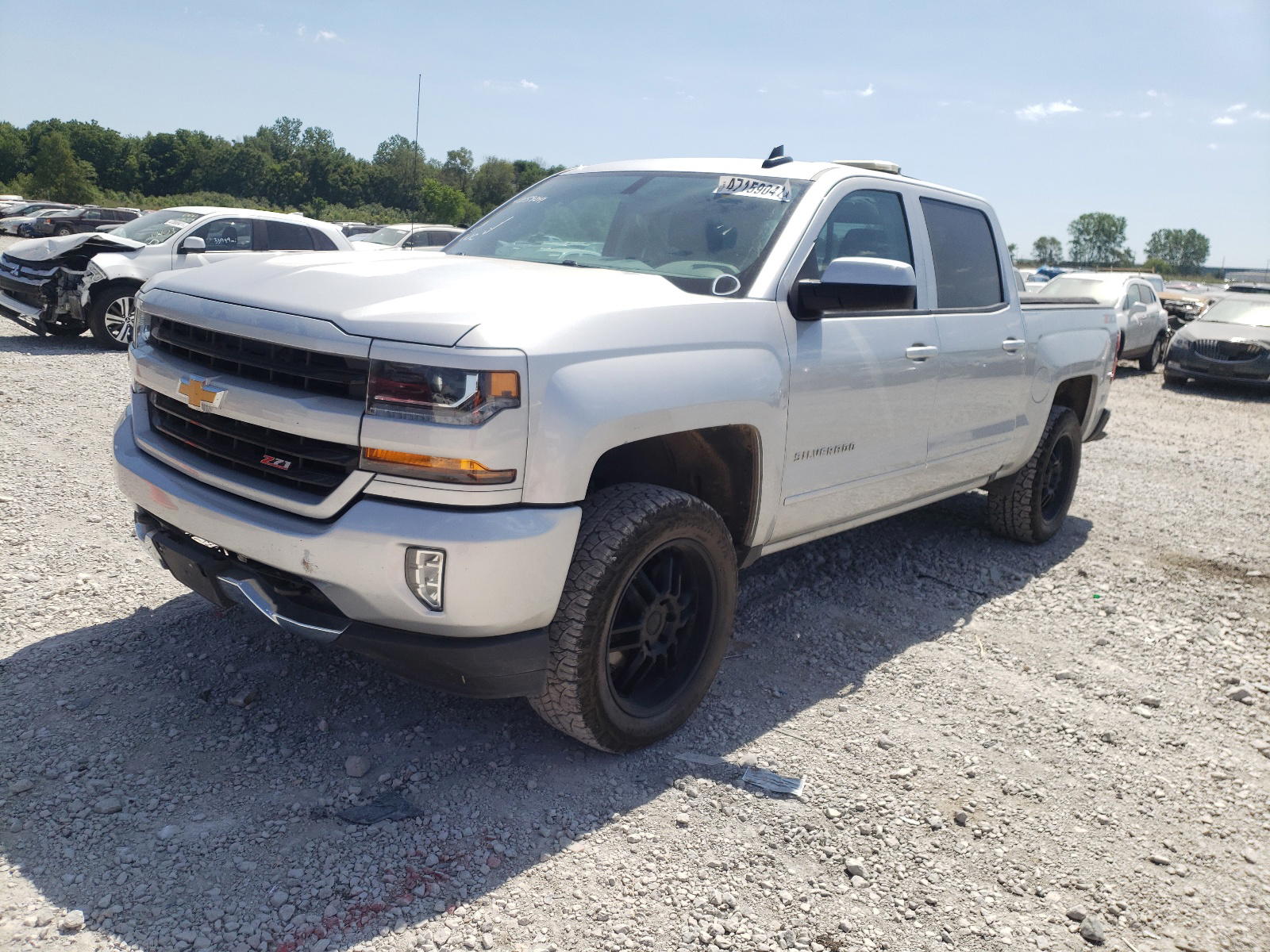 Photo 2 from auction – 2018 CHEVROLET SILVERADO with VIN 3GCUKREC7JG531695