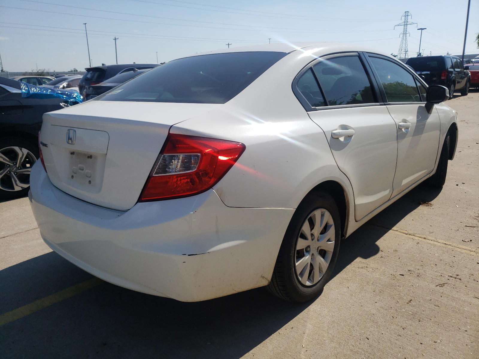 Photo 4 from auction – 2012 HONDA CIVIC LX with VIN 2HGFB2F57CH558383