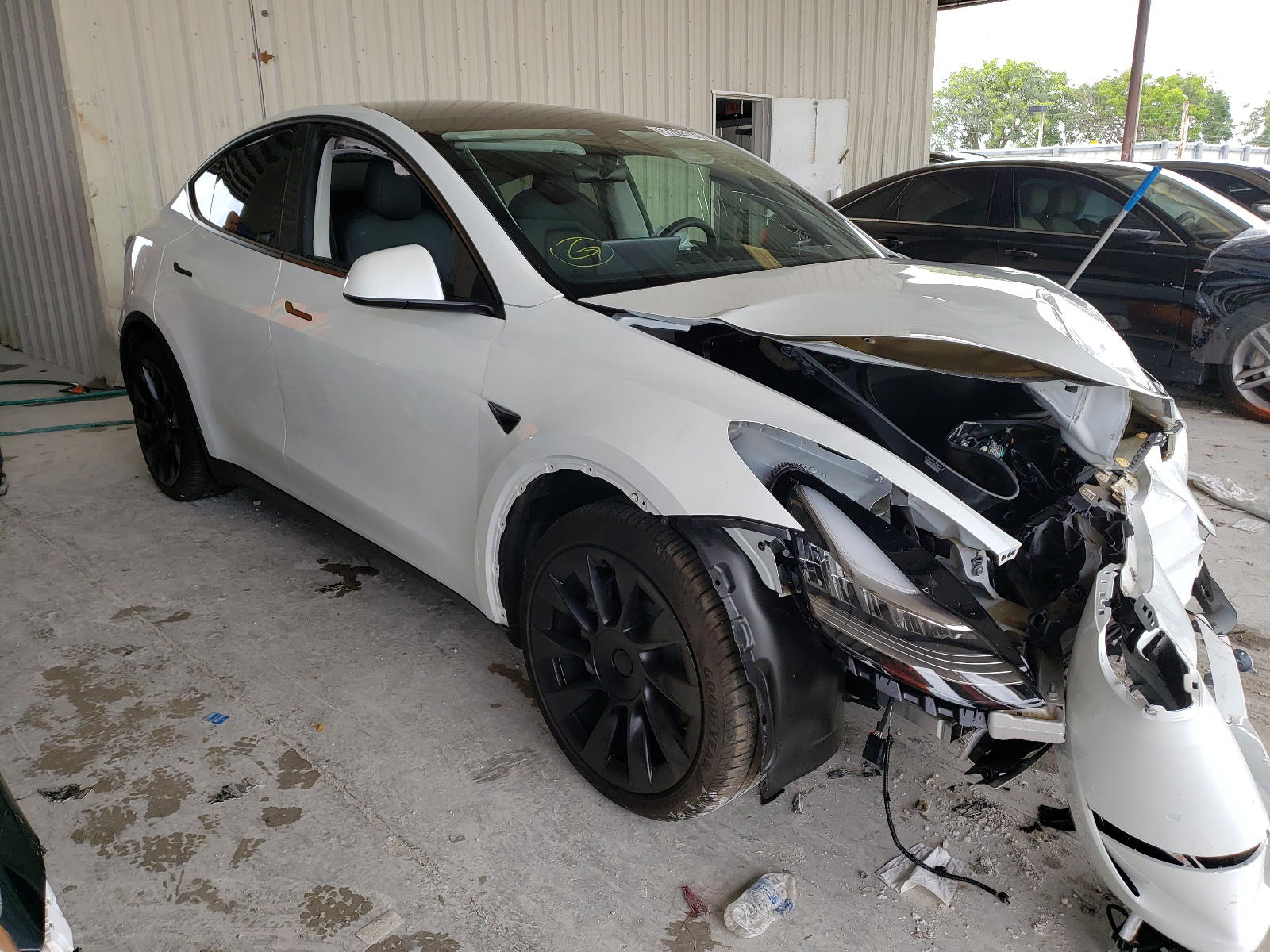 TESLA MODEL Y 2021 with VIN 5YJYGDED8MF103711 - Photo from auction