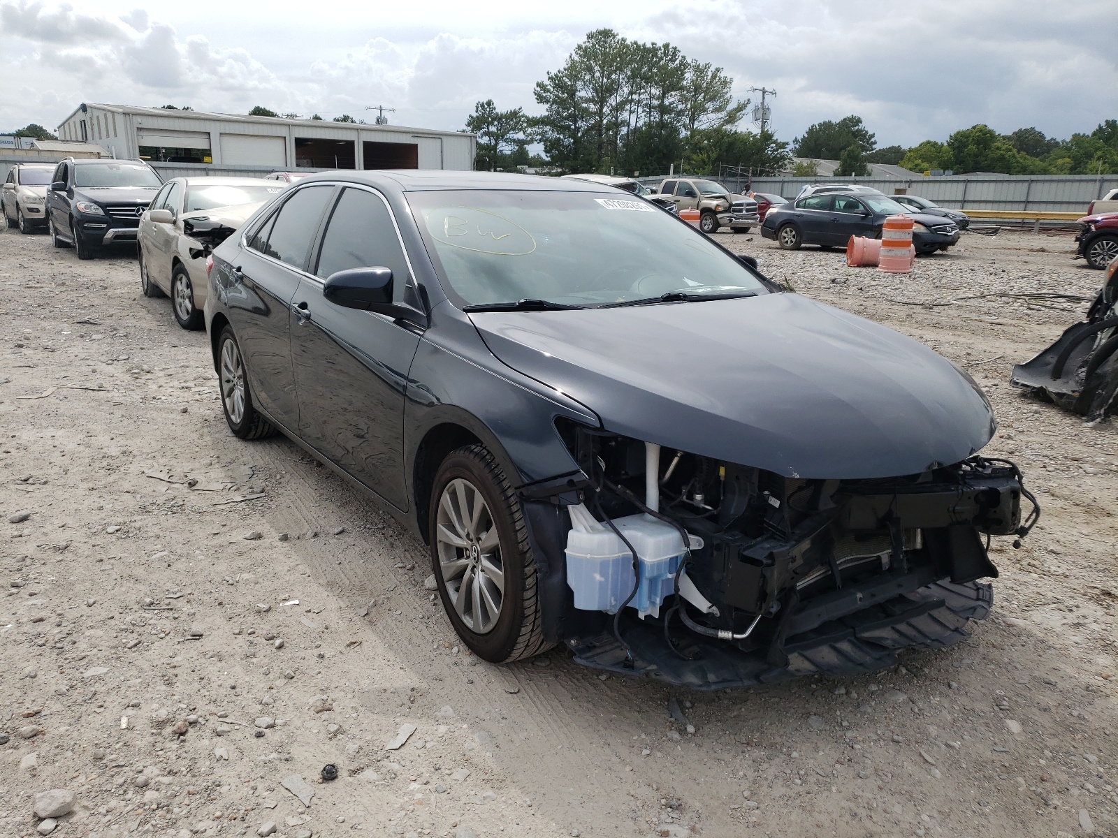 TOYOTA CAMRY LE 2017 with VIN 4T1BF1FK3HU776791 - Photo from auction