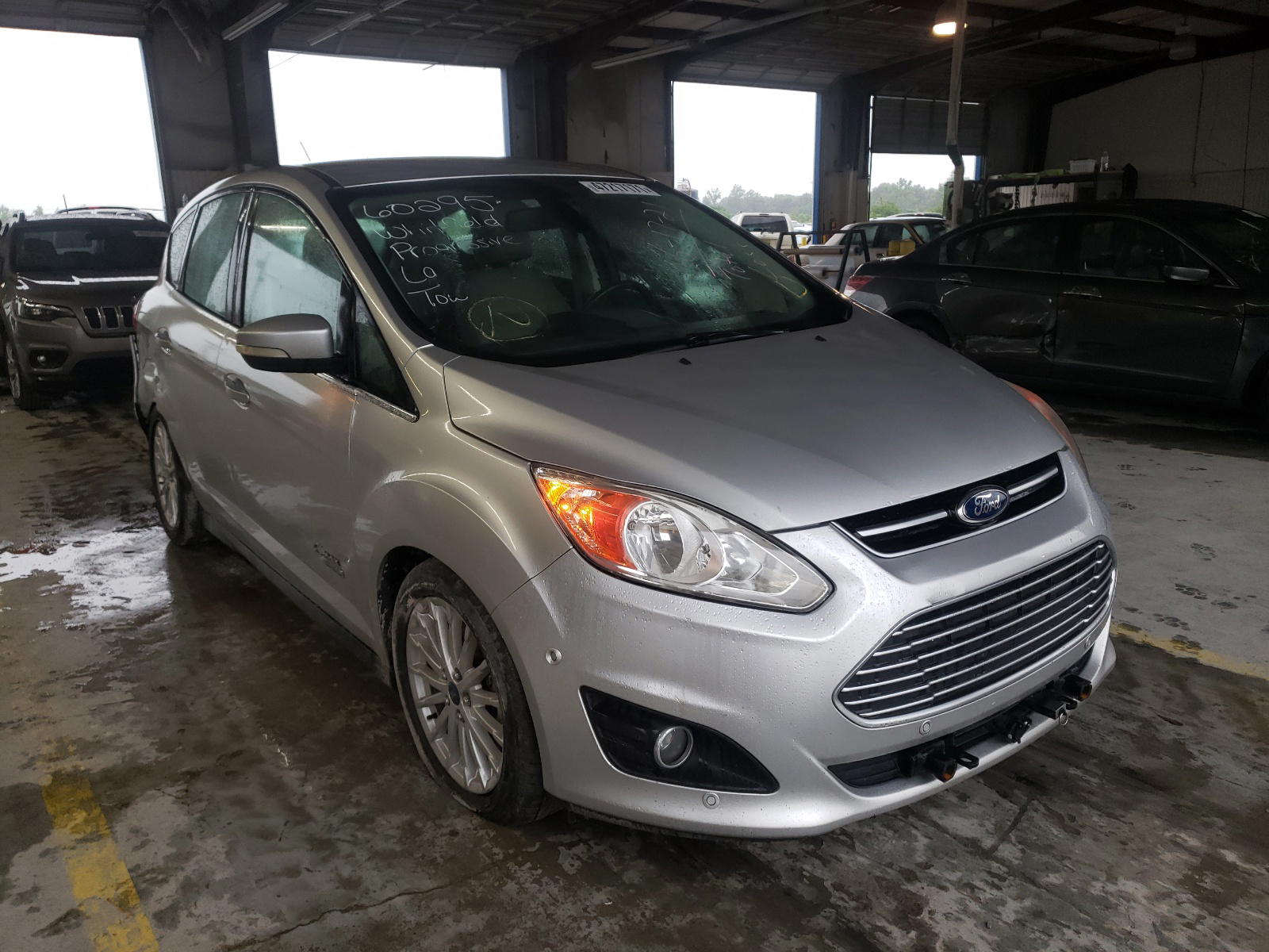 FORD C-MAX PREM 2013 with VIN 1FADP5CUXDL550924 - Photo from auction