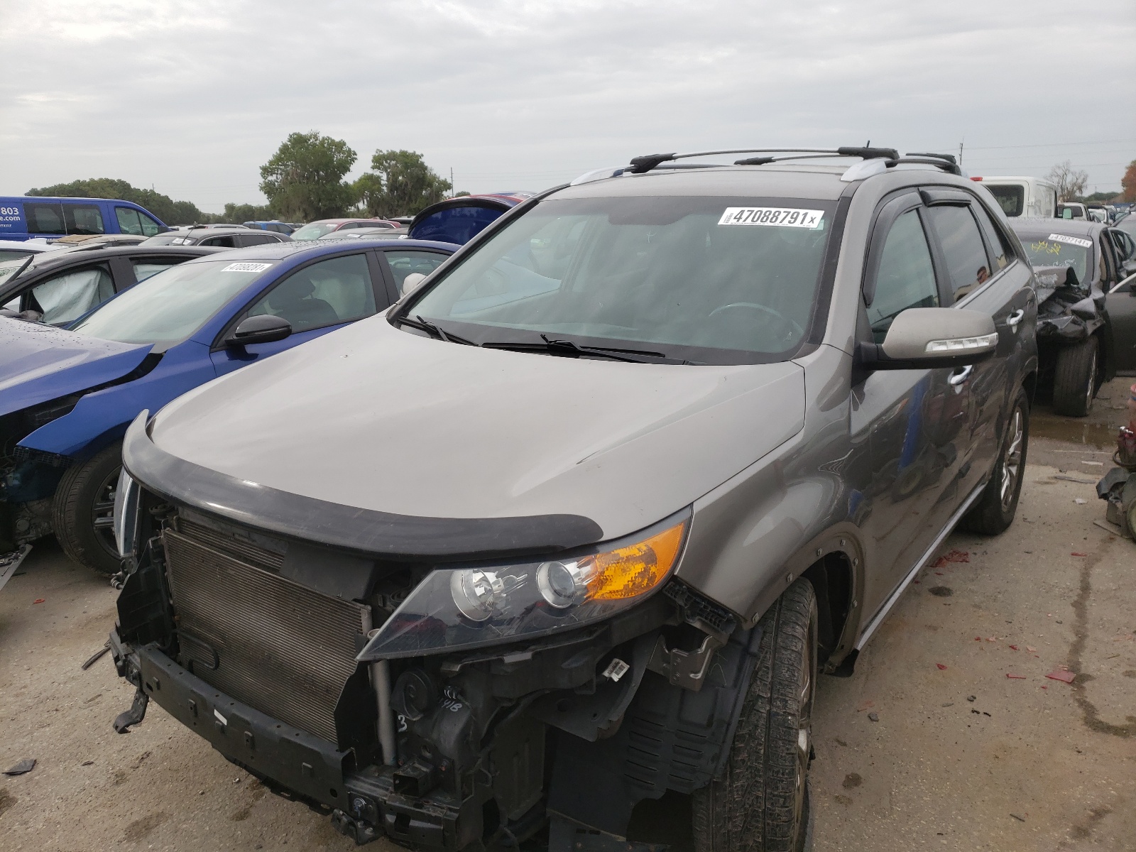 Photo 2 from auction – 2012 KIA SORENTO SX with VIN 5XYKW4A25CG262982