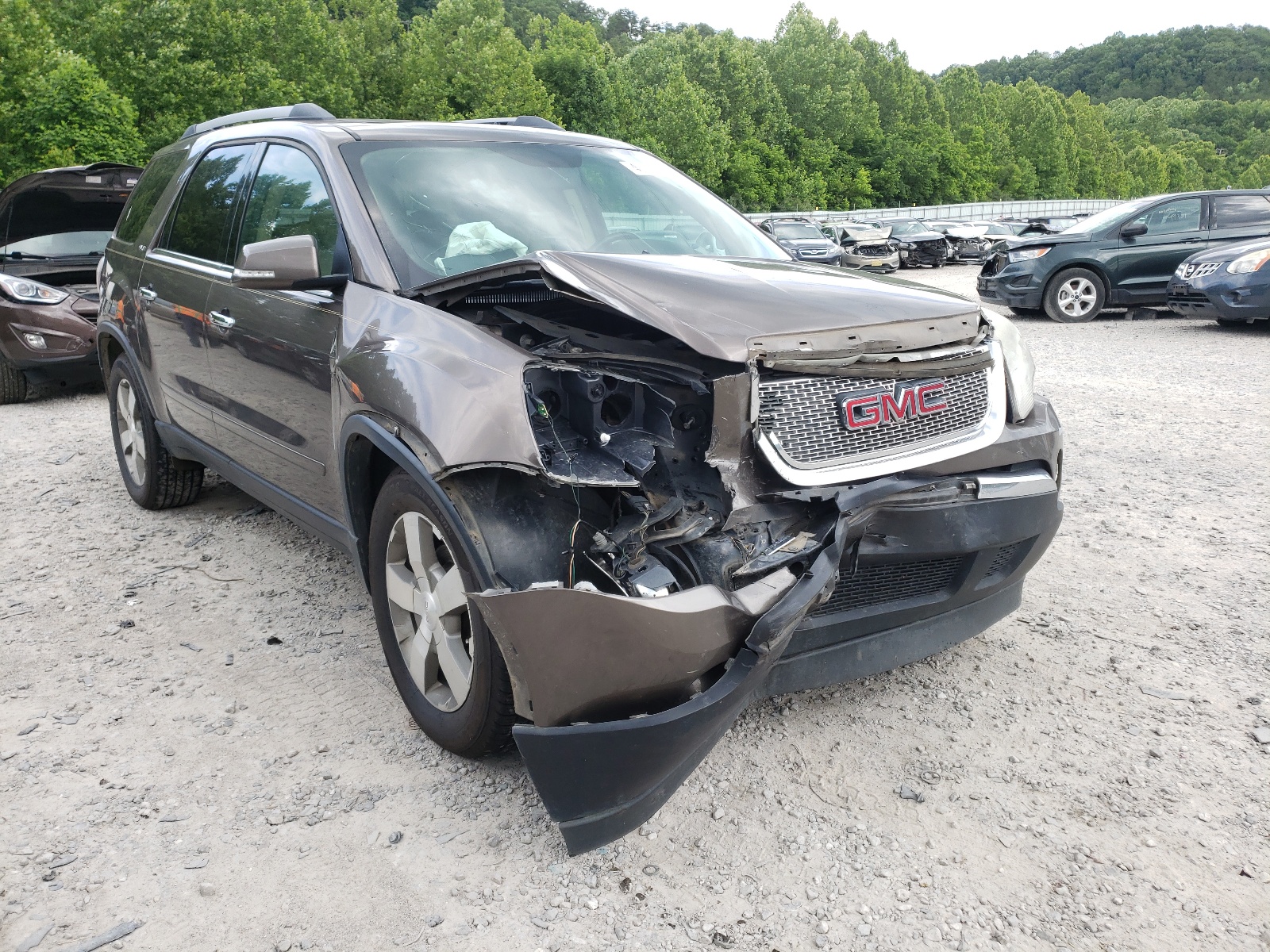 GMC ACADIA SLT 2011 with VIN 1GKKRRED9BJ271560 - Photo from auction