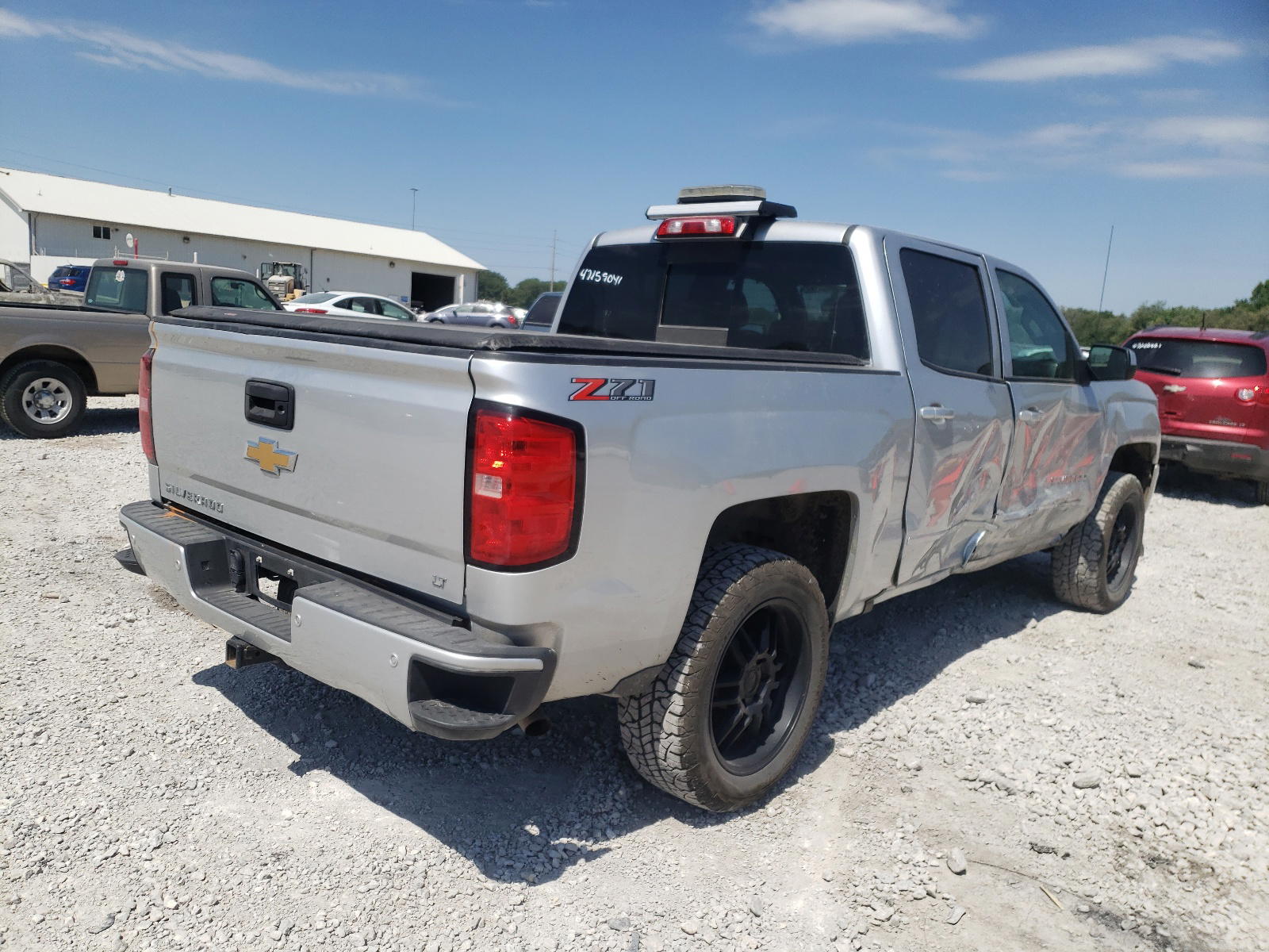 Photo 4 from auction – 2018 CHEVROLET SILVERADO with VIN 3GCUKREC7JG531695