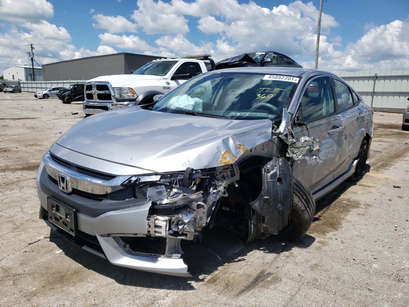 Photo 2 from auction – 2017 HONDA CIVIC LX with VIN 19XFC2F54HE011277