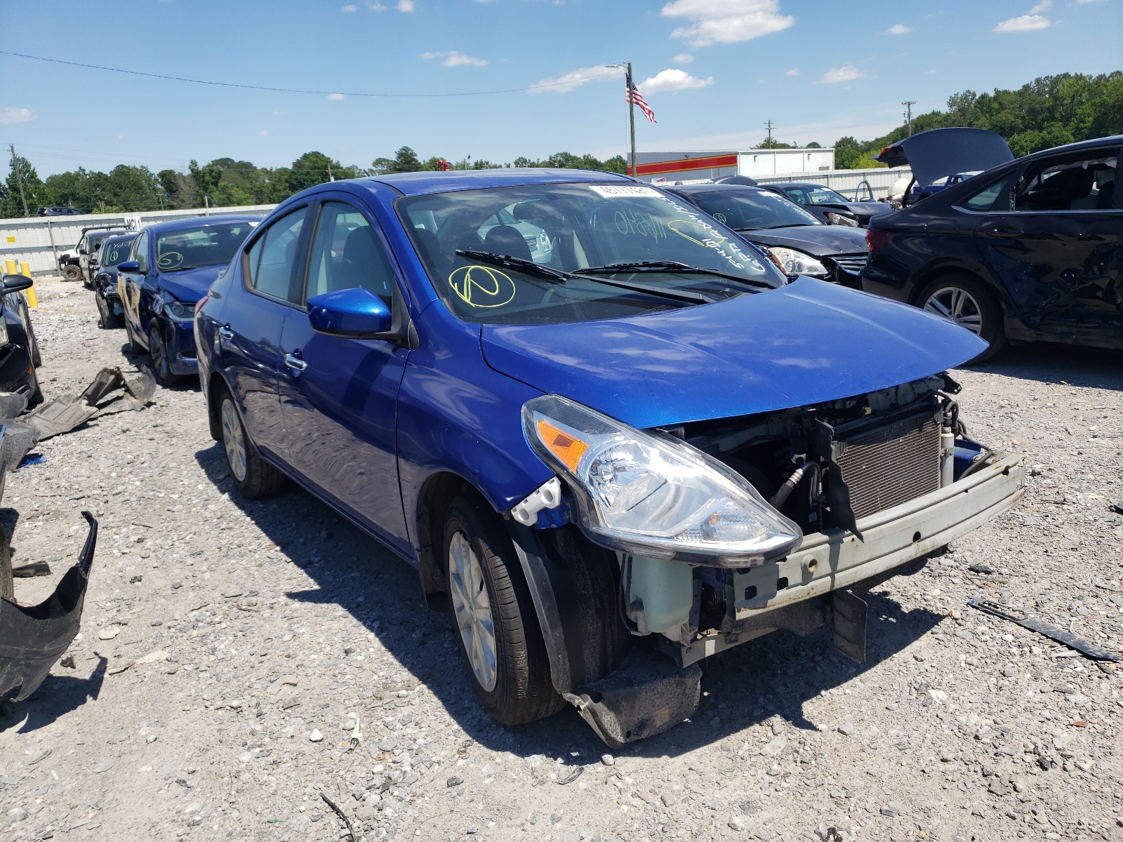 NISSAN VERSA S 2015 with VIN 3N1CN7APXFL813413 - Photo from auction
