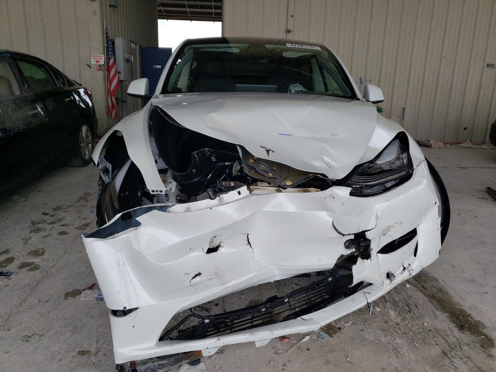 Photo 9 from auction – 2021 TESLA MODEL Y with VIN 5YJYGDED8MF103711
