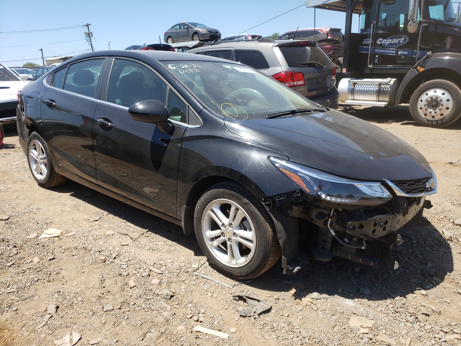 CHEVROLET CRUZE 2018 with VIN 1G1BE5SM9J7185870 - Photo from auction