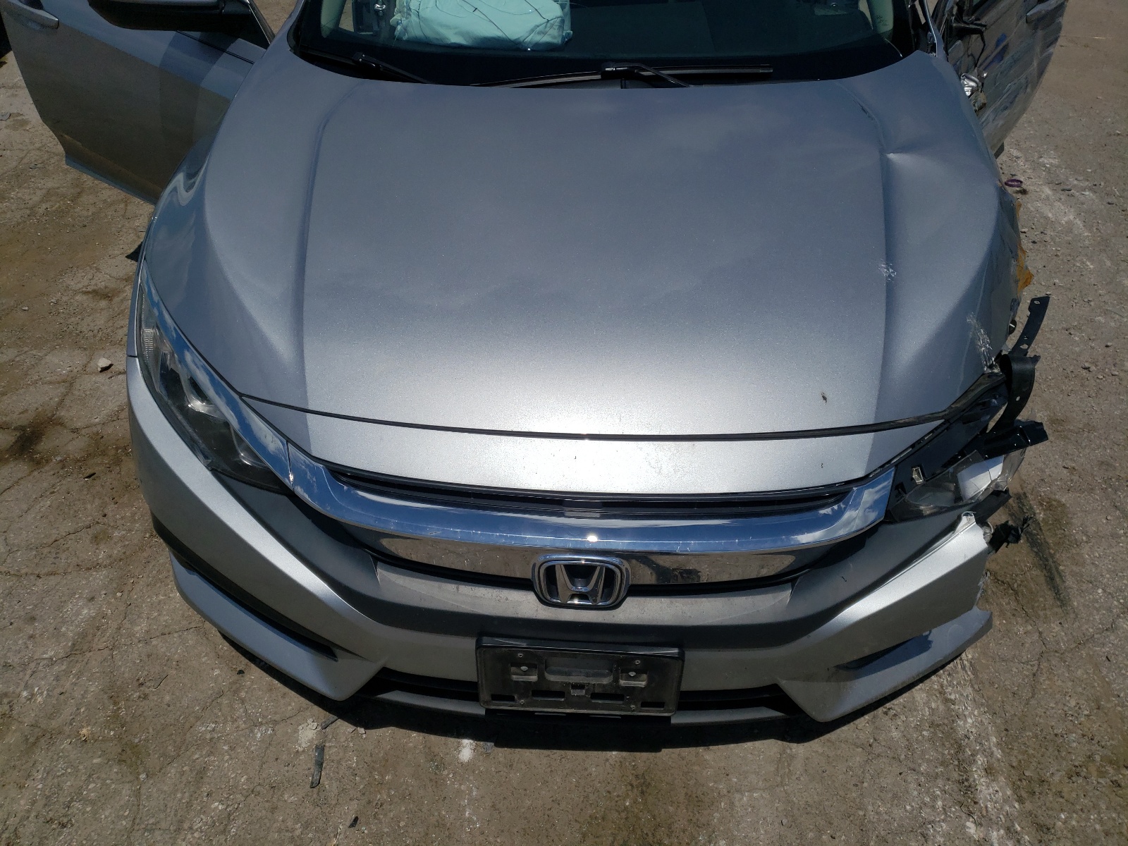 Photo 7 from auction – 2017 HONDA CIVIC LX with VIN 19XFC2F54HE011277