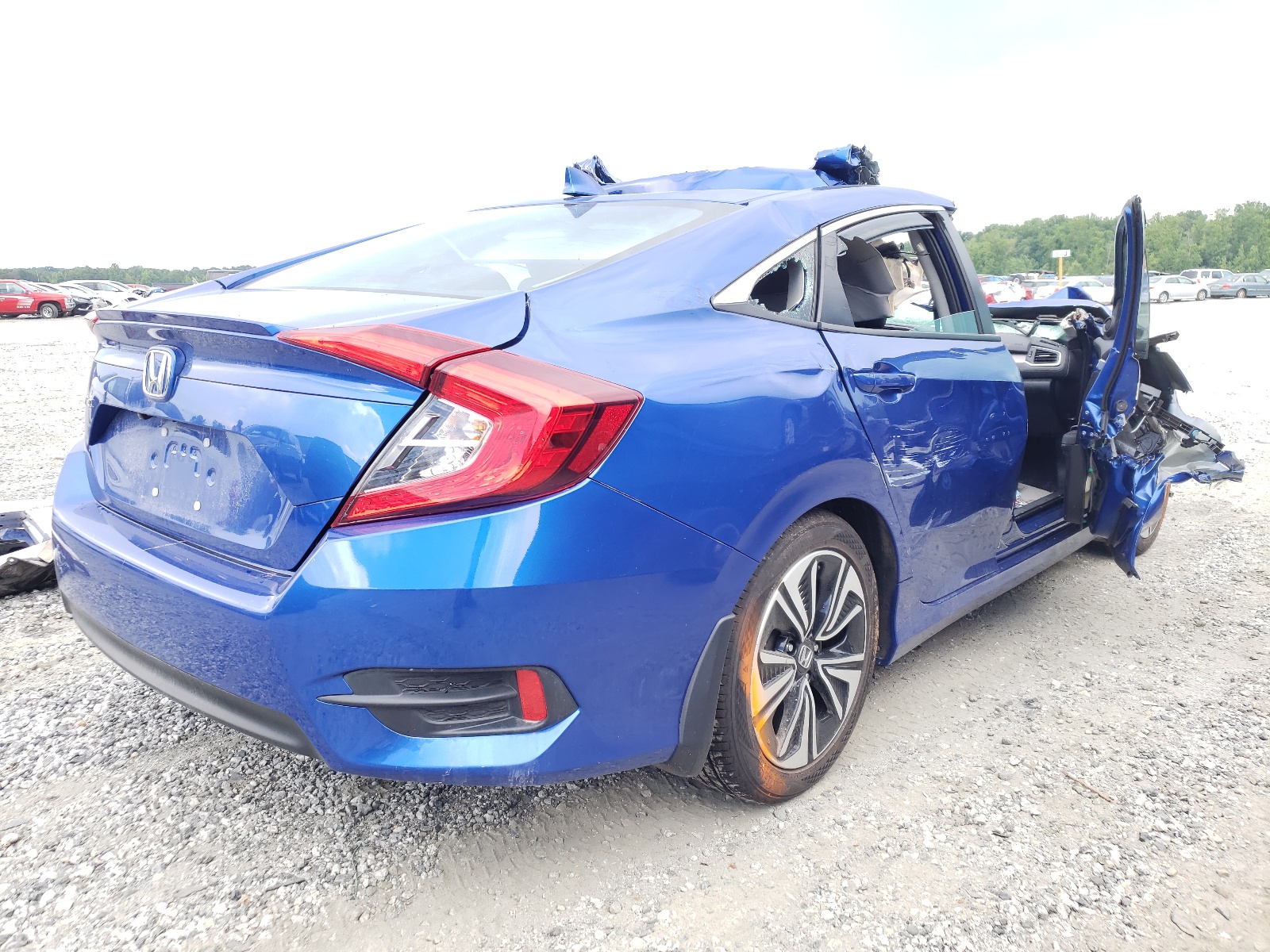 Photo 4 from auction – 2018 HONDA CIVIC EX with VIN 19XFC1E30JE004066