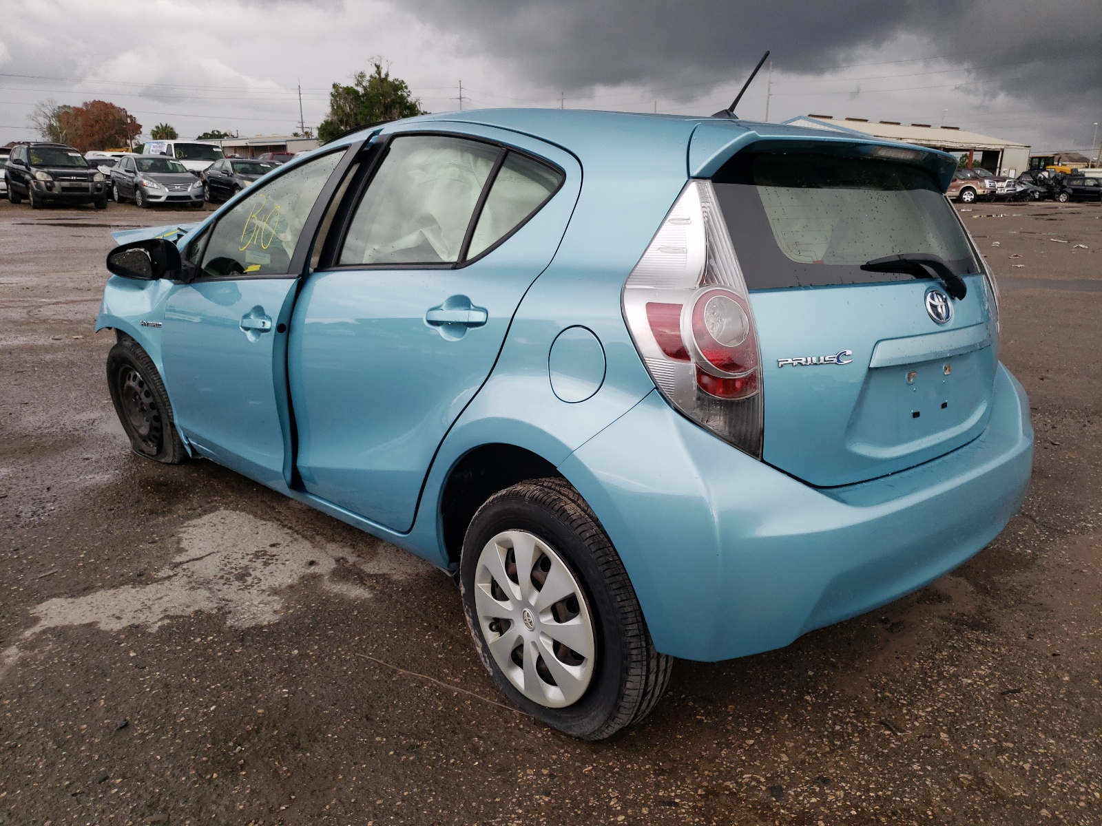 Photo 3 from auction – 2013 TOYOTA PRIUS C with VIN JTDKDTB33D1038005