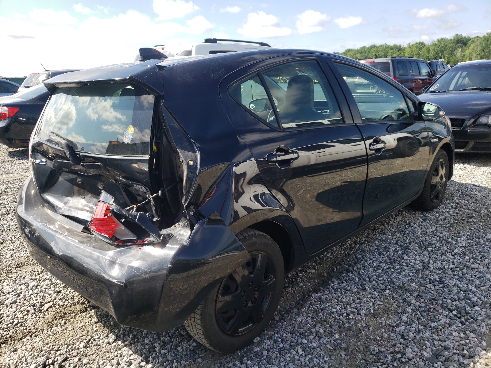 Photo 4 from auction – 2015 TOYOTA PRIUS C with VIN JTDKDTB31F1096715