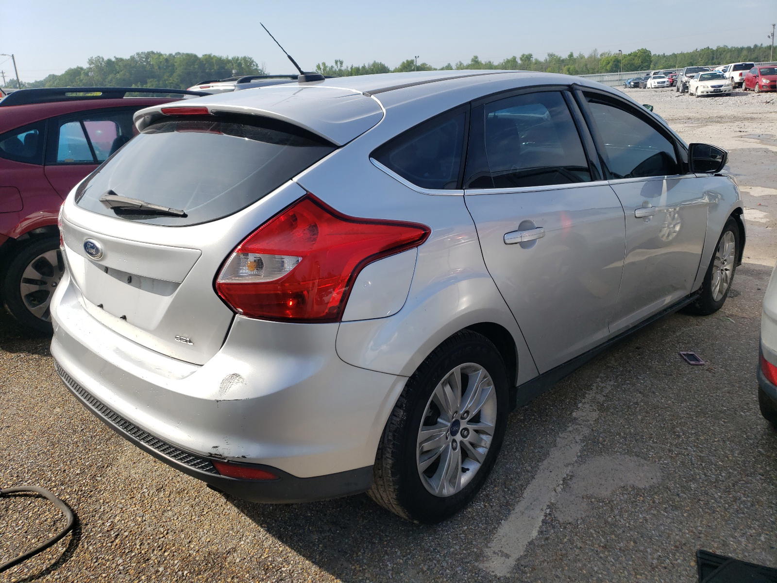 Photo 4 from auction – 2012 FORD FOCUS SEL with VIN 1FAHP3M20CL358249