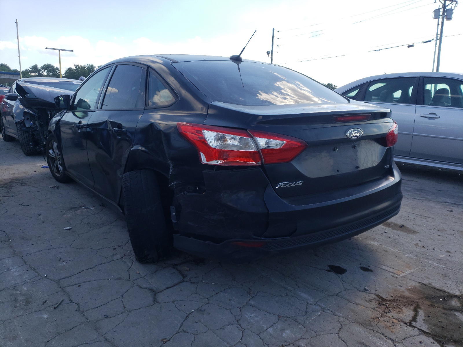 Photo 3 from auction – 2014 FORD FOCUS SE with VIN 1FADP3F22EL410124