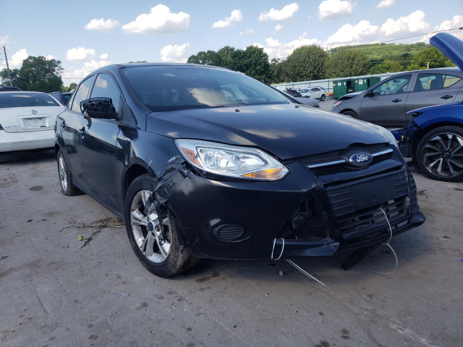 FORD FOCUS SE 2014 with VIN 1FADP3F22EL410124 - Photo from auction