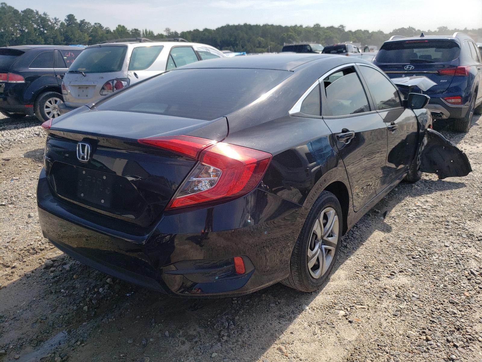 Photo 4 from auction – 2017 HONDA CIVIC LX with VIN 2HGFC2F52HH501755