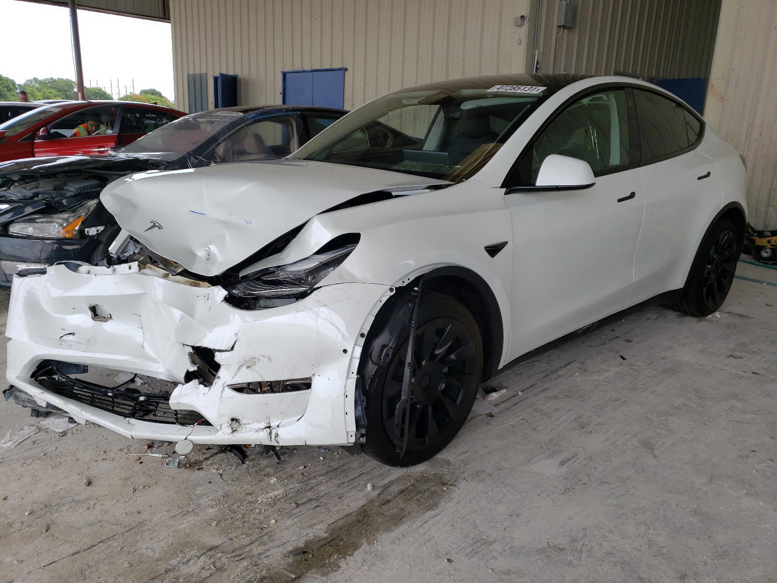 Photo 2 from auction – 2021 TESLA MODEL Y with VIN 5YJYGDED8MF103711
