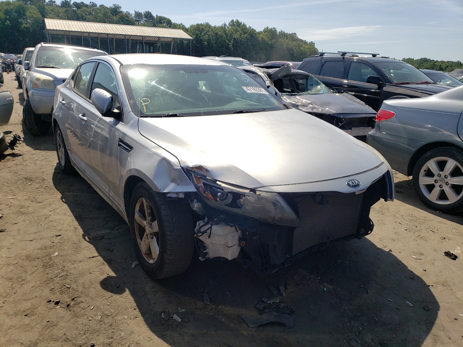 KIA OPTIMA LX 2015 with VIN 5XXGM4A75FG401718 - Photo from auction