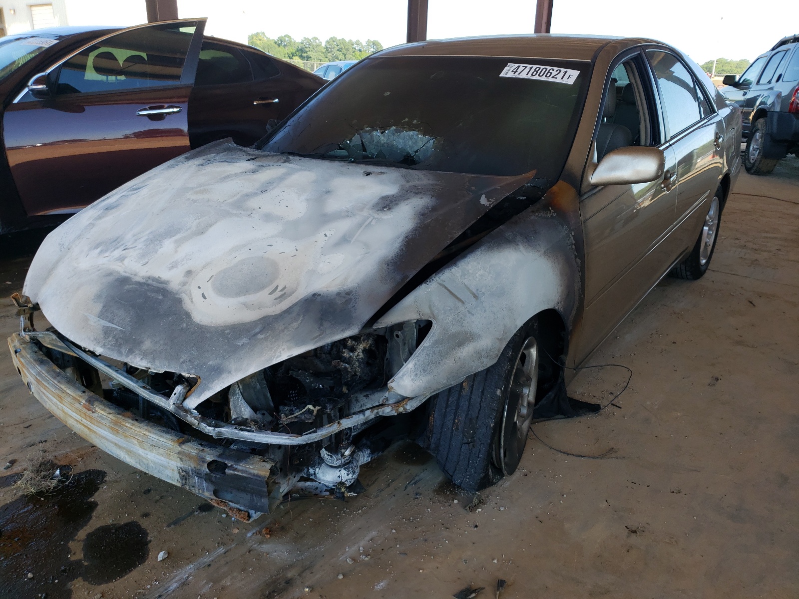 Photo 2 from auction – 2003 TOYOTA CAMRY LE with VIN JTDBE32K230185179