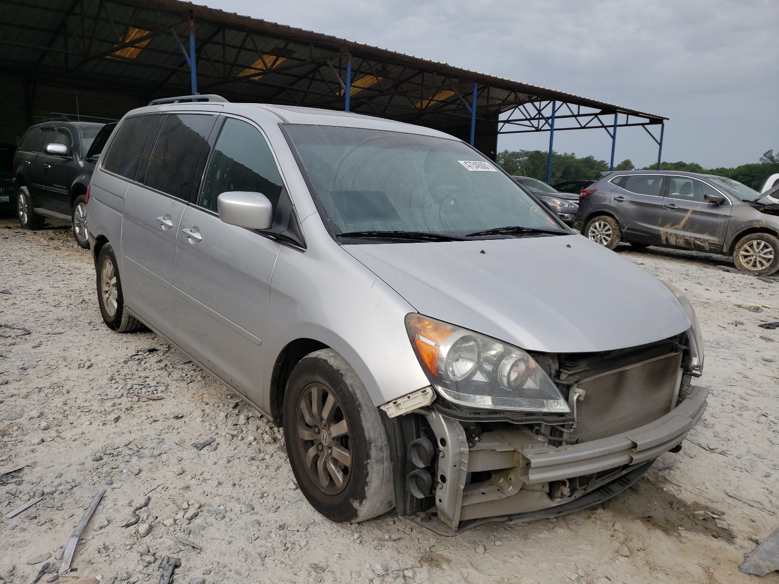HONDA ODYSSEY EX 2010 with VIN 5FNRL3H63AB083046 - Photo from auction