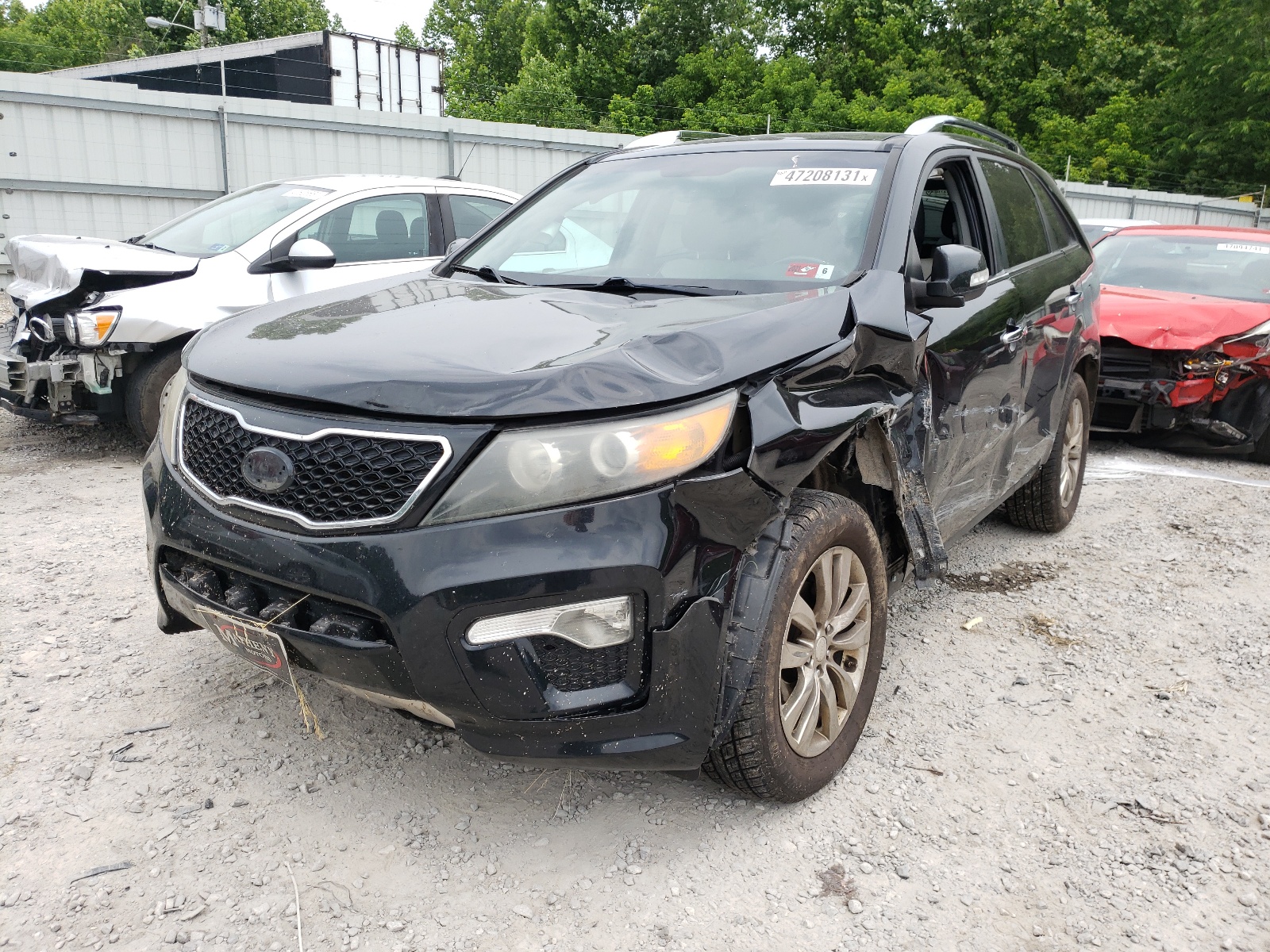 Photo 2 from auction – 2012 KIA SORENTO SX with VIN 5XYKWDA23CG210282