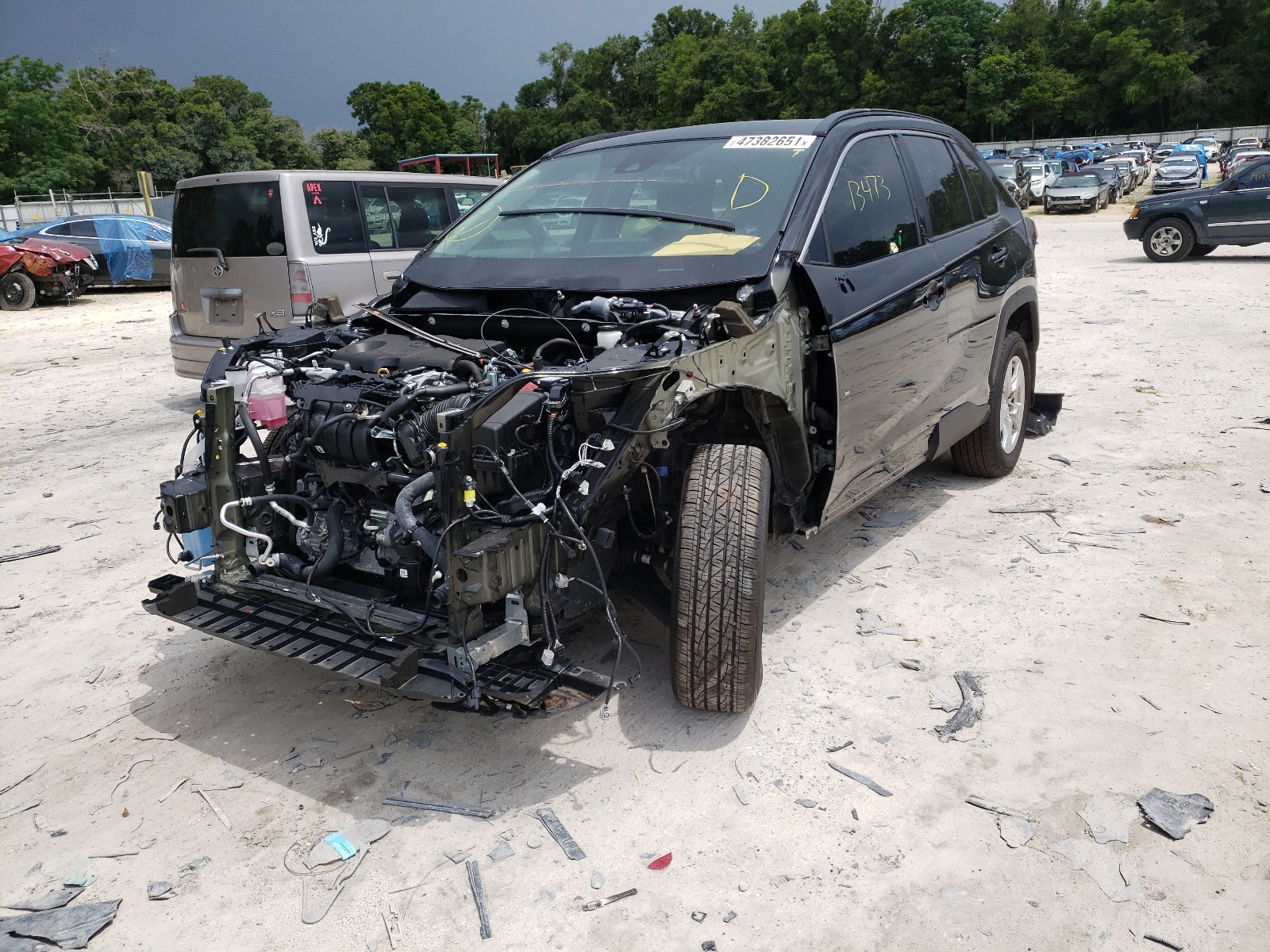 Photo 2 from auction – 2021 TOYOTA RAV4 XLE with VIN 2T3W1RFV7MC095660