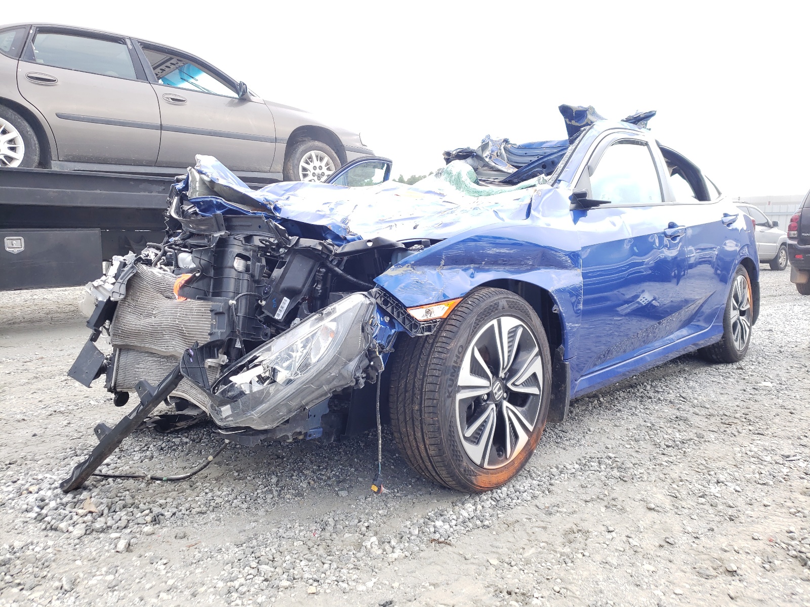 Photo 2 from auction – 2018 HONDA CIVIC EX with VIN 19XFC1E30JE004066