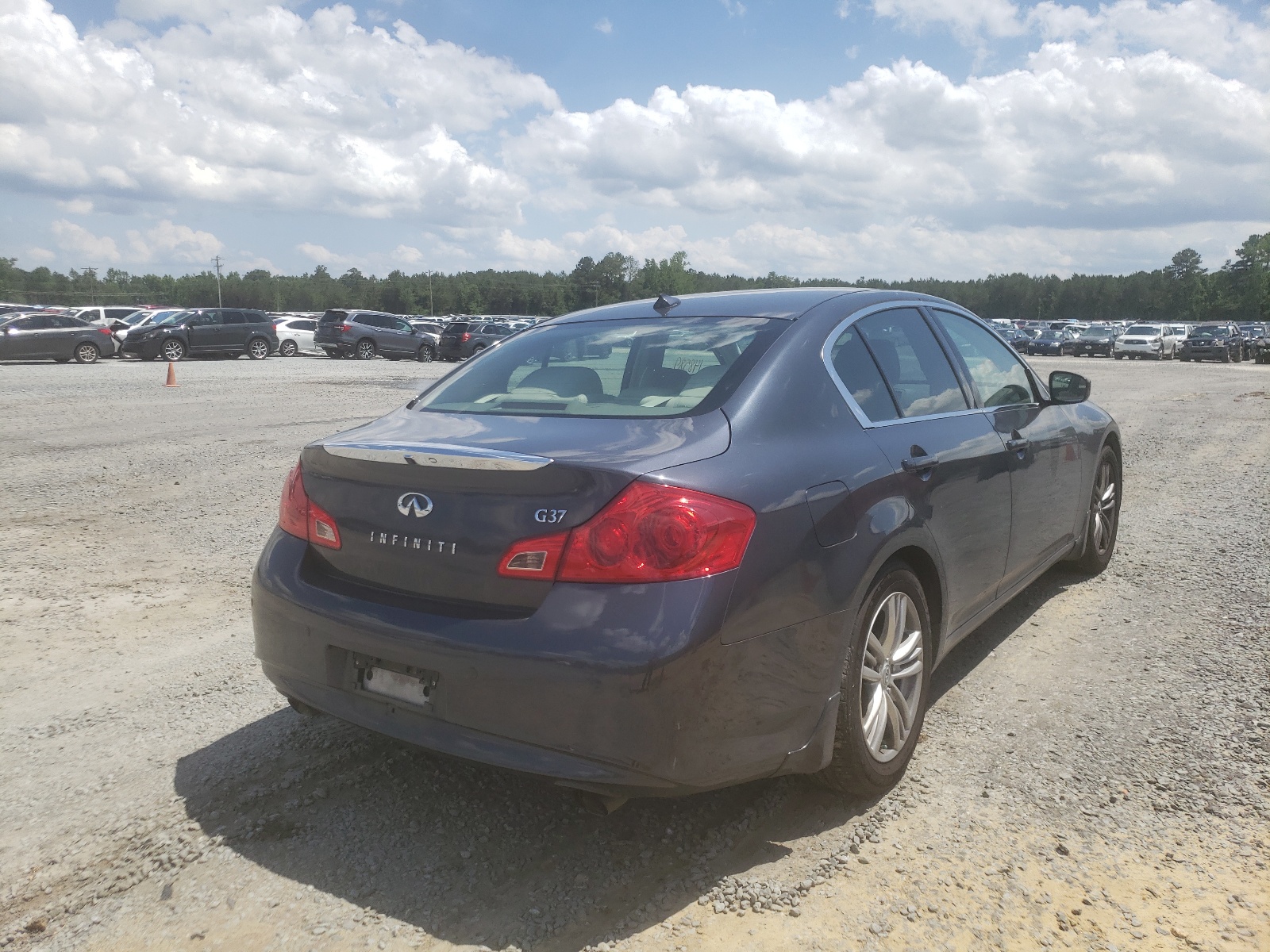 Photo 4 from auction – 2010 INFINITI G37 BASE with VIN JN1CV6APXAM203391