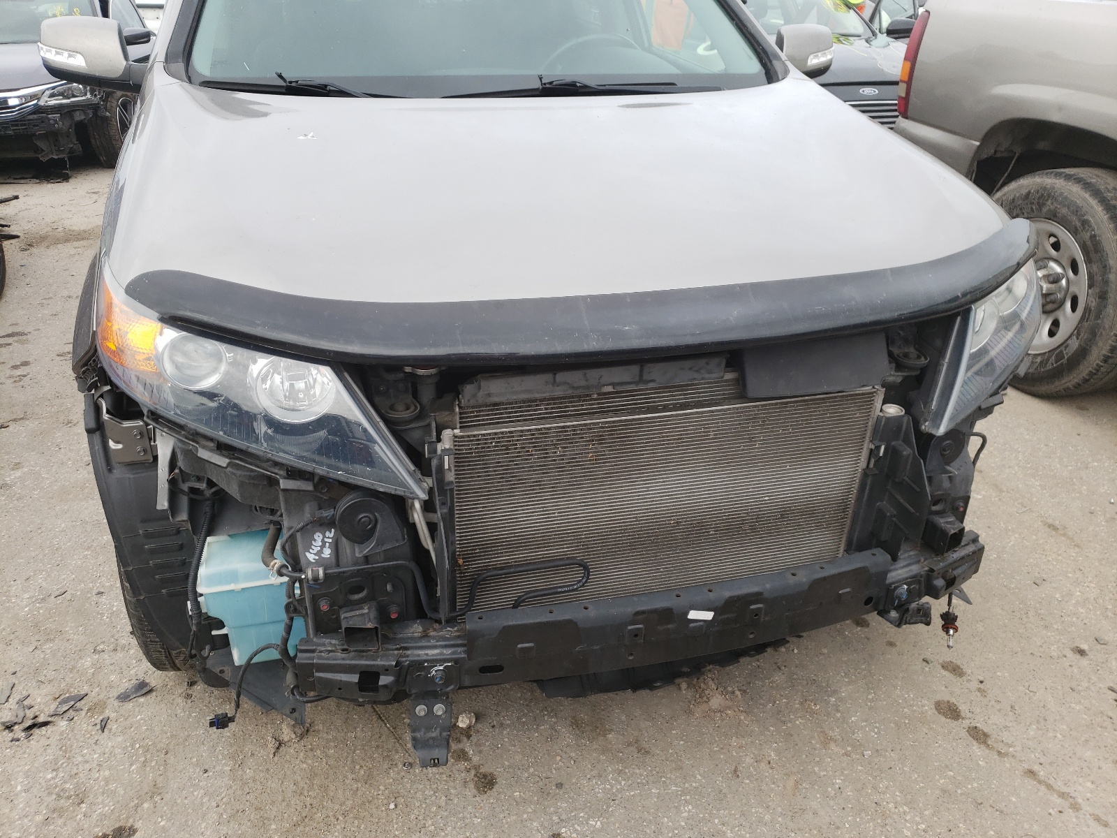 Photo 9 from auction – 2012 KIA SORENTO SX with VIN 5XYKW4A25CG262982