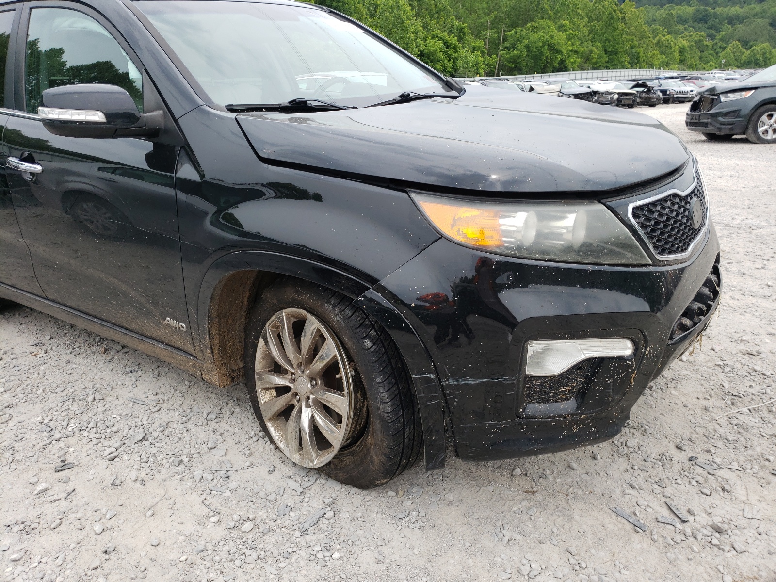 Photo 9 from auction – 2012 KIA SORENTO SX with VIN 5XYKWDA23CG210282