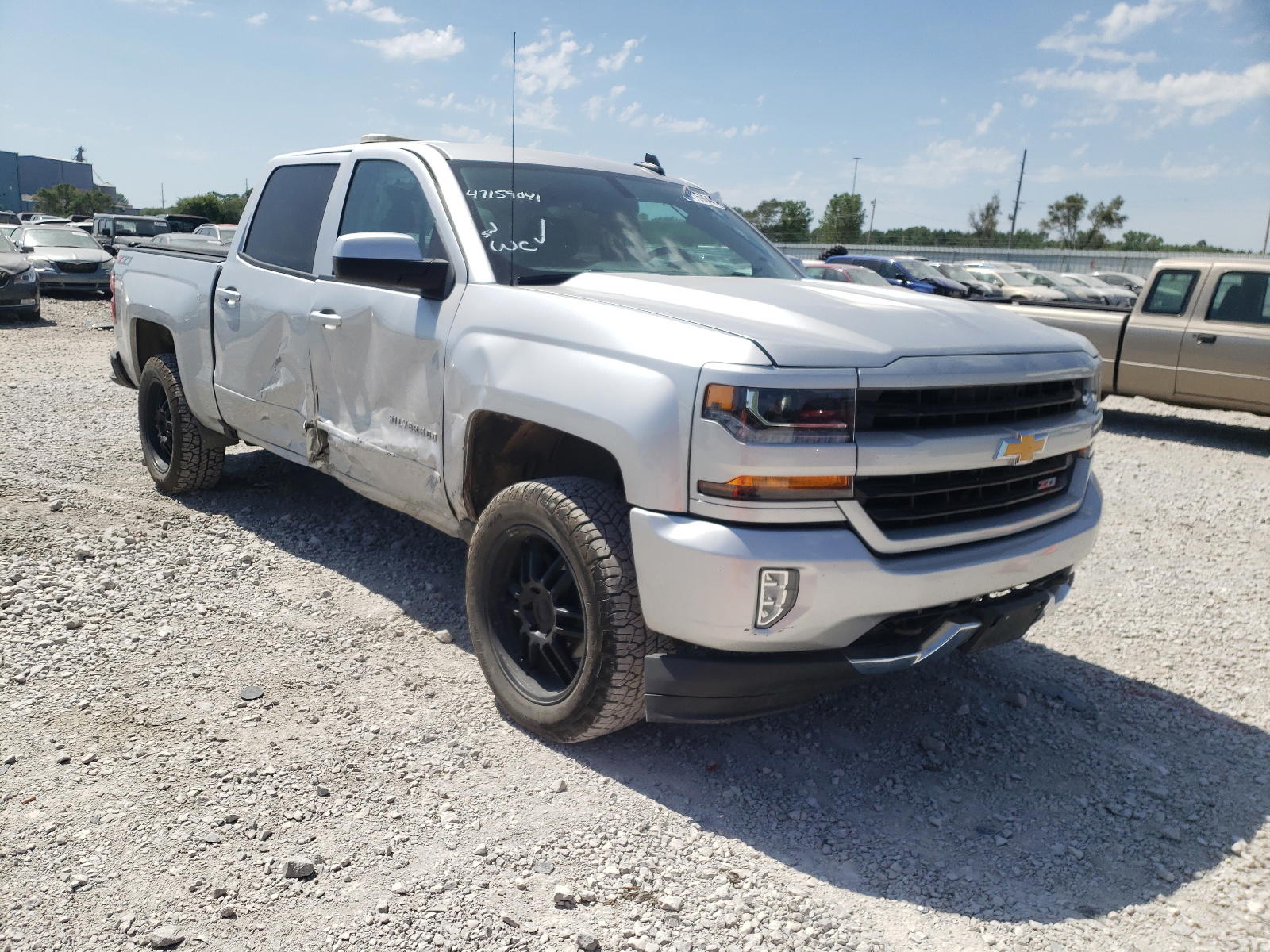 CHEVROLET SILVERADO 2018 with VIN 3GCUKREC7JG531695 - Photo from auction