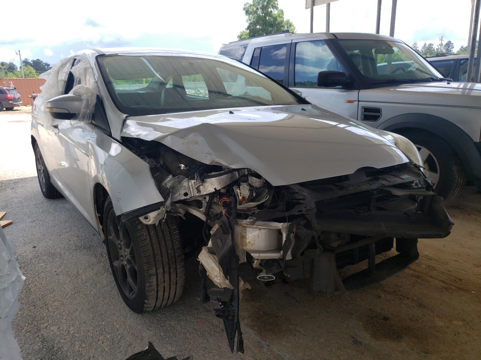 Photo 2 from auction – 2013 FORD FOCUS SE with VIN 1FADP3F27DL162824