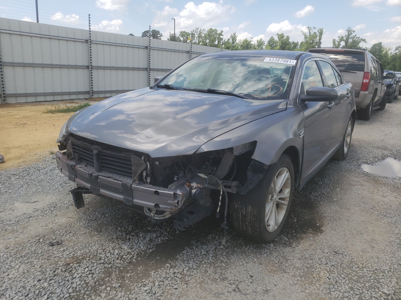 Foto 2 de la subasta – 2013 FORD TAURUS SEL con VIN 1FAHP2E94DG215403