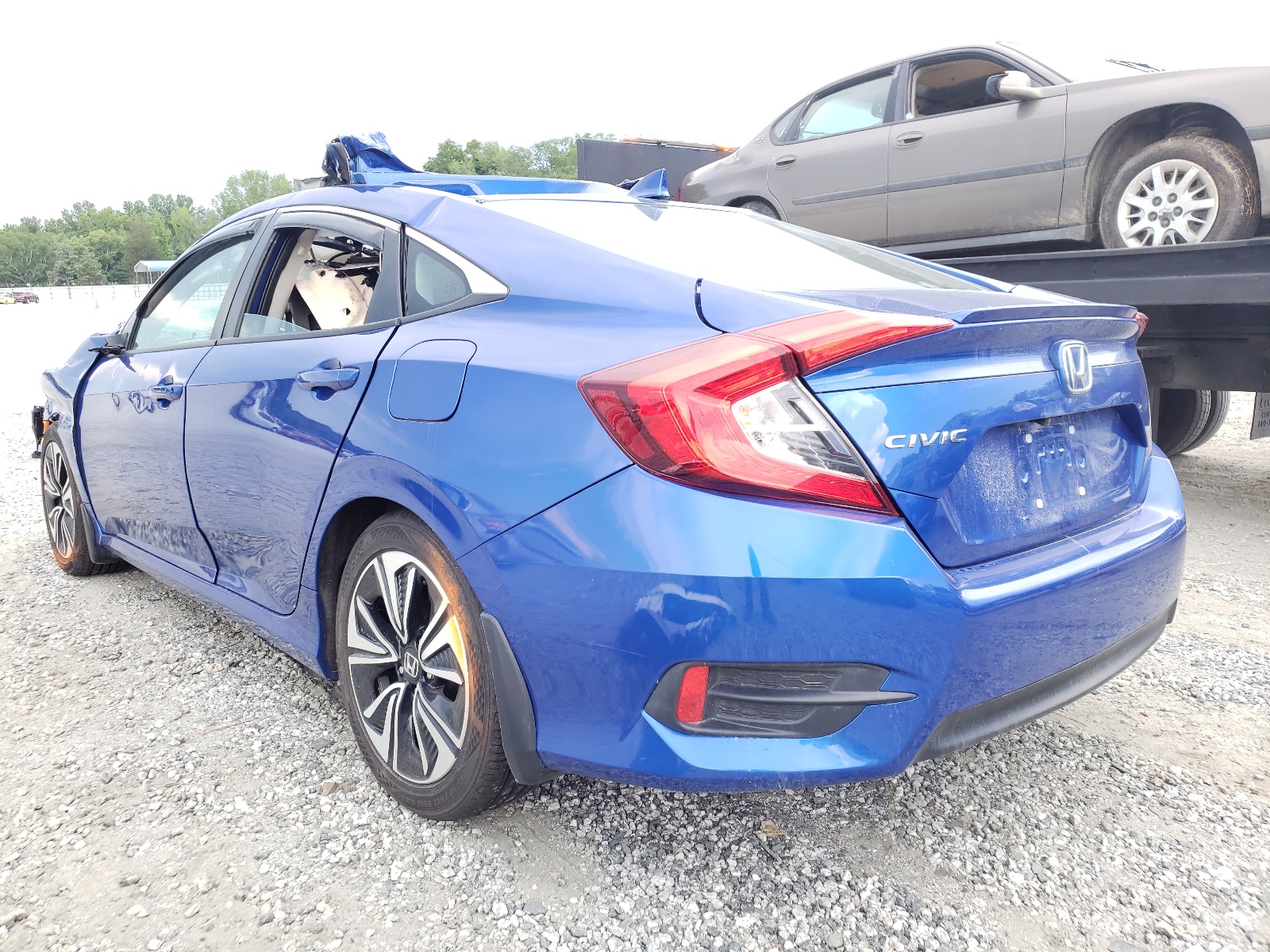 Photo 3 from auction – 2018 HONDA CIVIC EX with VIN 19XFC1E30JE004066