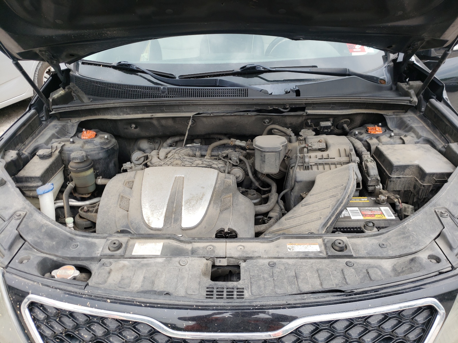 Photo 7 from auction – 2012 KIA SORENTO SX with VIN 5XYKWDA23CG210282