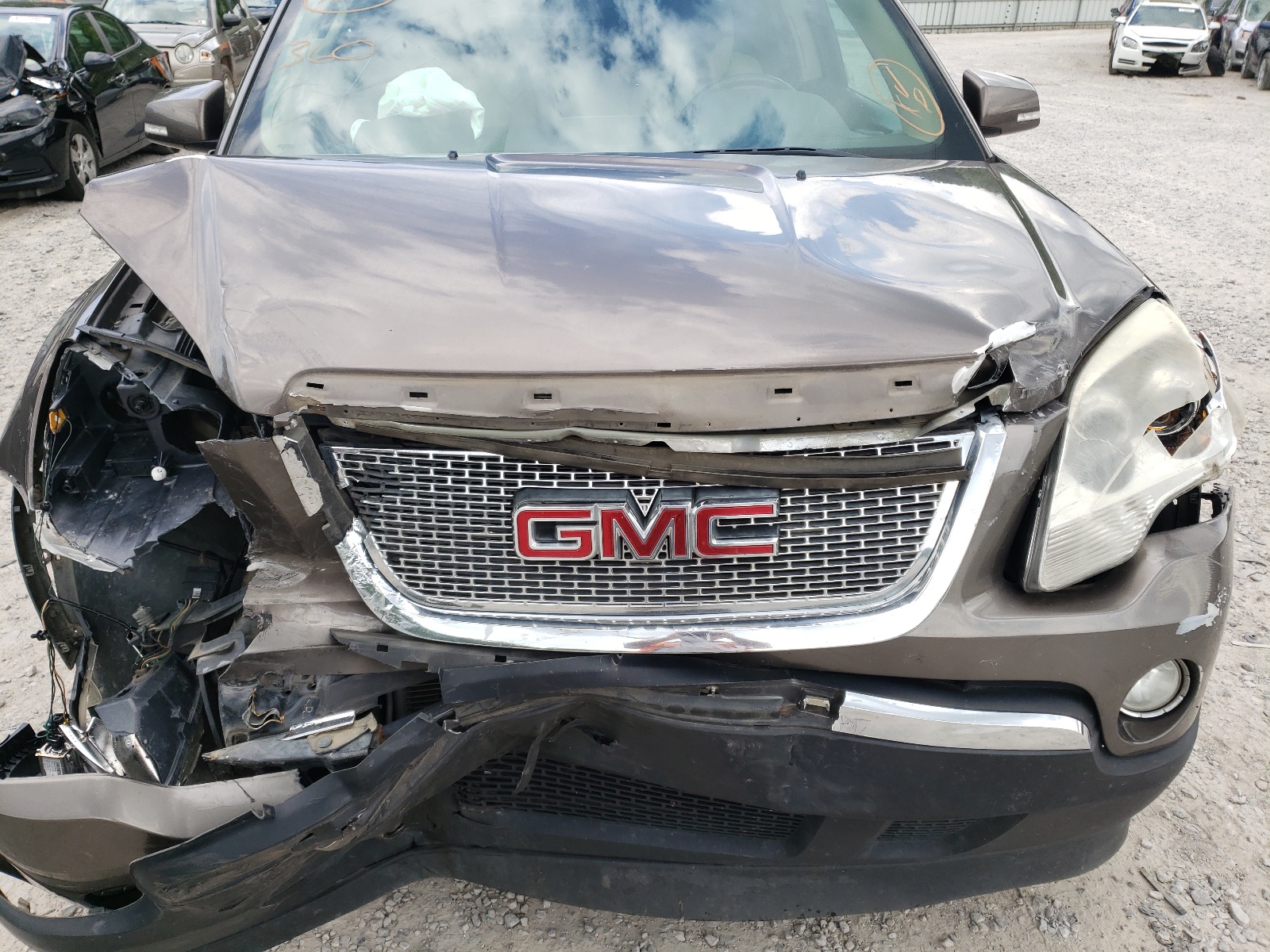 Photo 7 from auction – 2011 GMC ACADIA SLT with VIN 1GKKRRED9BJ271560