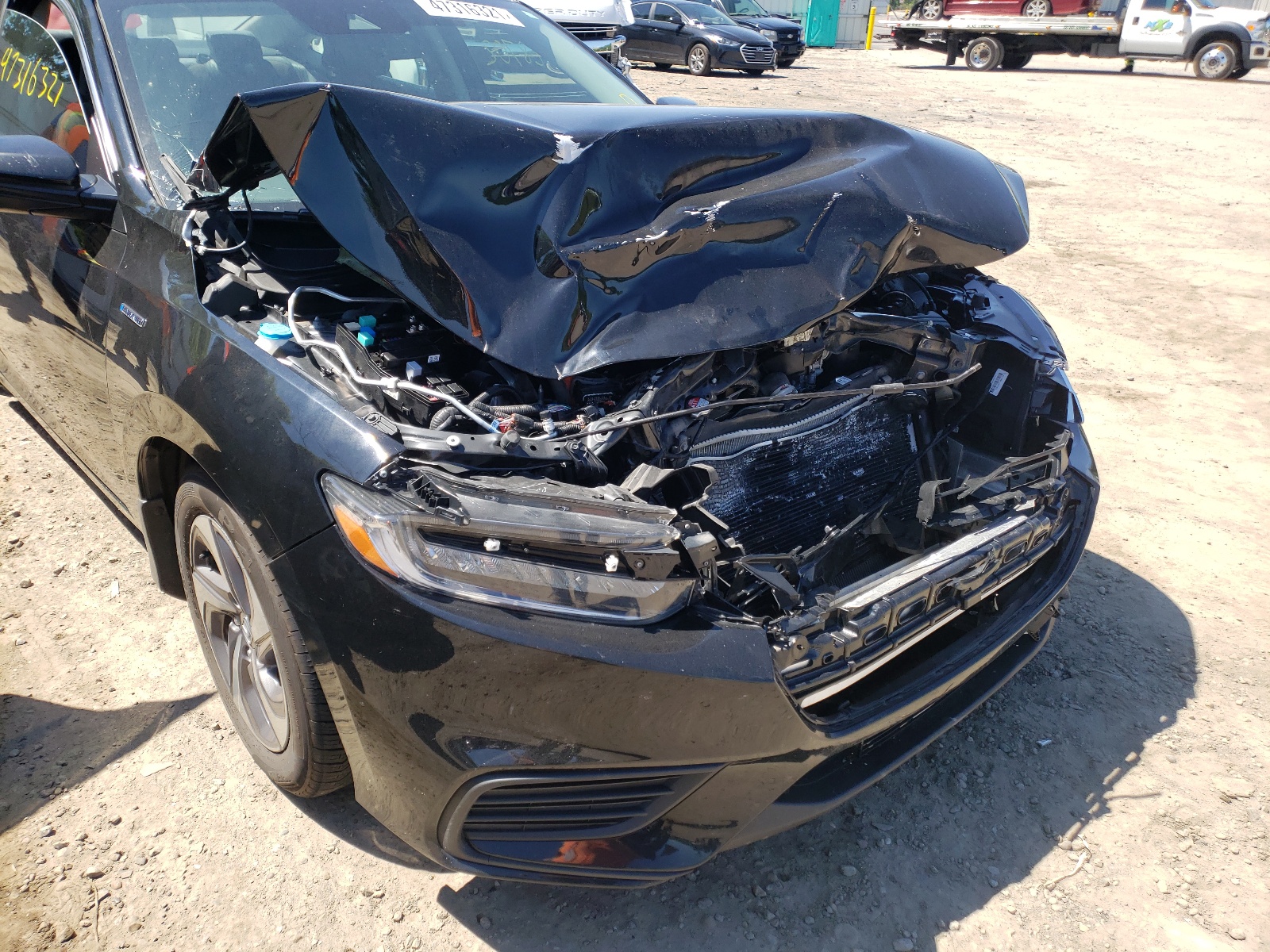Photo 9 from auction – 2019 HONDA INSIGHT EX with VIN 19XZE4F58KE033406