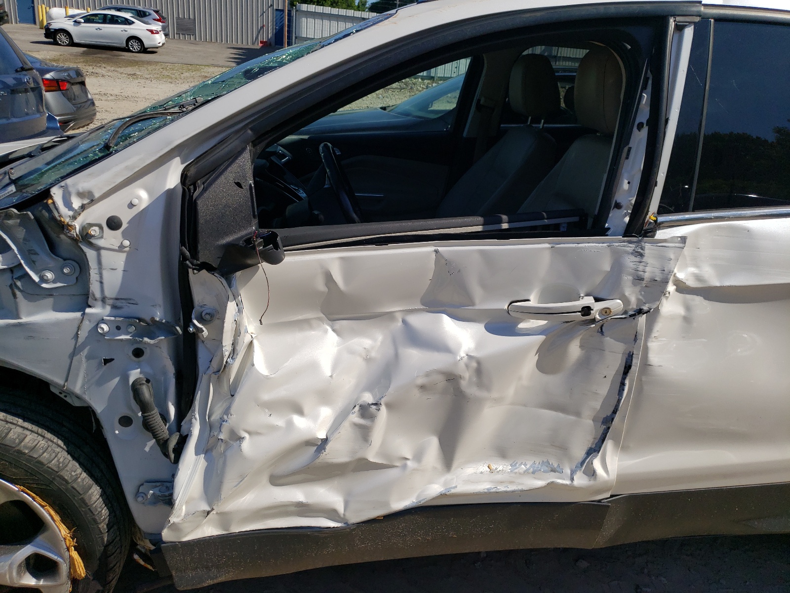 Photo 10 from auction – 2014 FORD ESCAPE TIT with VIN 1FMCU9J9XEUA18293