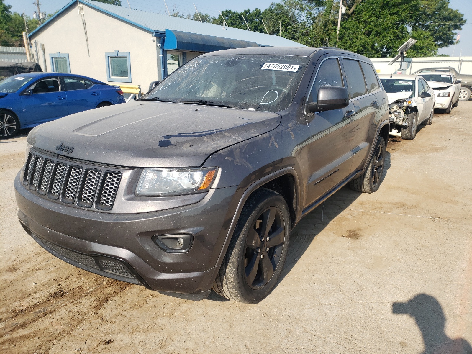 Photo 2 from auction – 2014 JEEP GRAND CHER with VIN 1C4RJFAG1EC541311