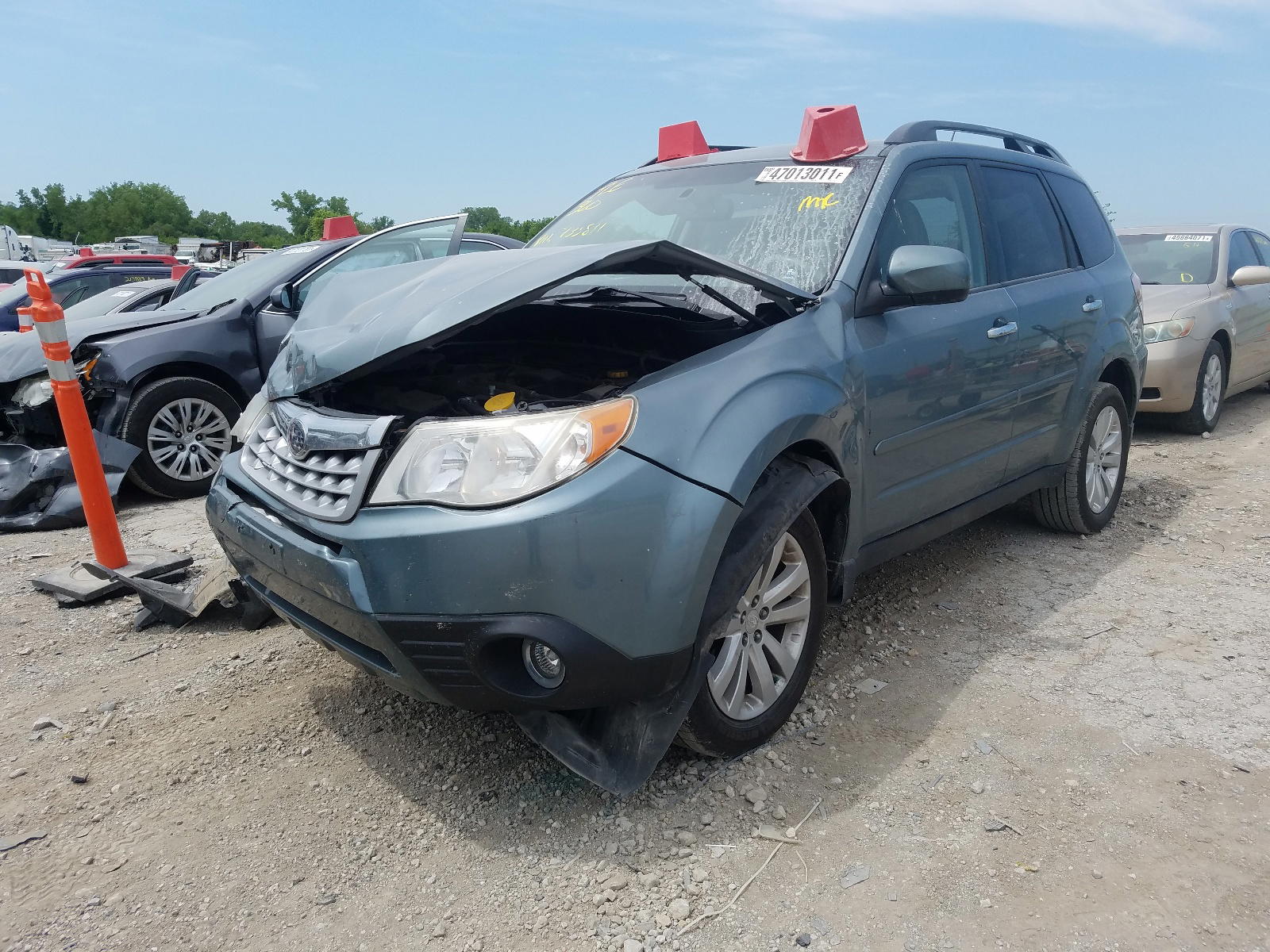 Photo 2 from auction – 2011 SUBARU FORESTER L with VIN JF2SHBECXBH733811