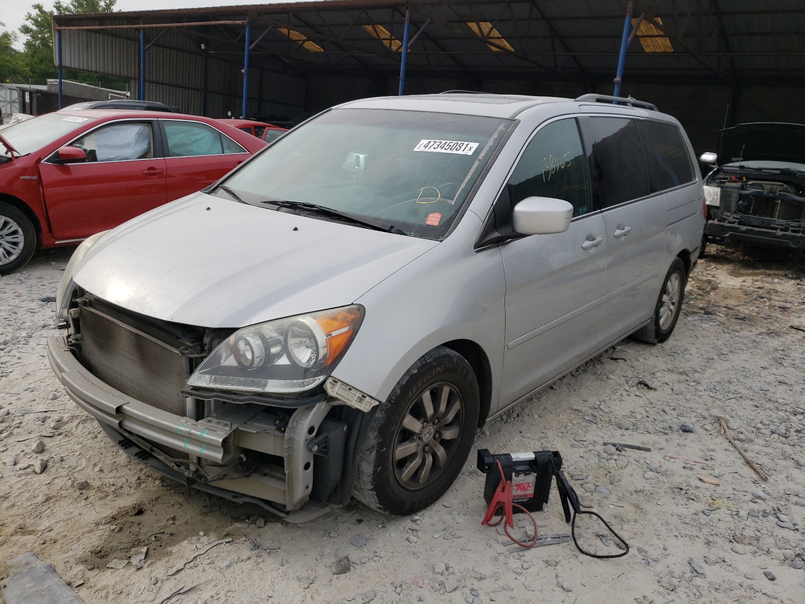 Photo 2 from auction – 2010 HONDA ODYSSEY EX with VIN 5FNRL3H63AB083046