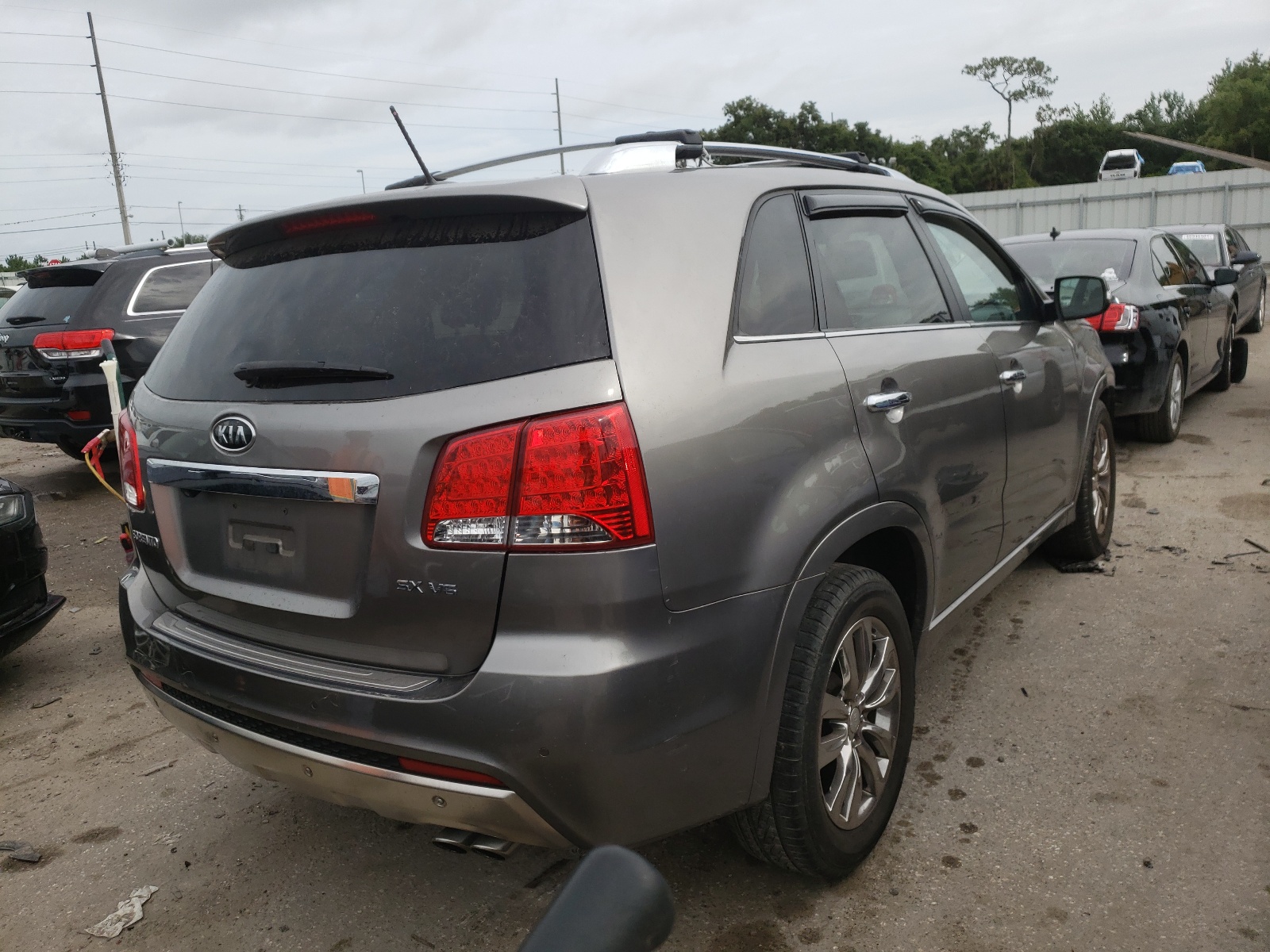 Photo 4 from auction – 2012 KIA SORENTO SX with VIN 5XYKW4A25CG262982