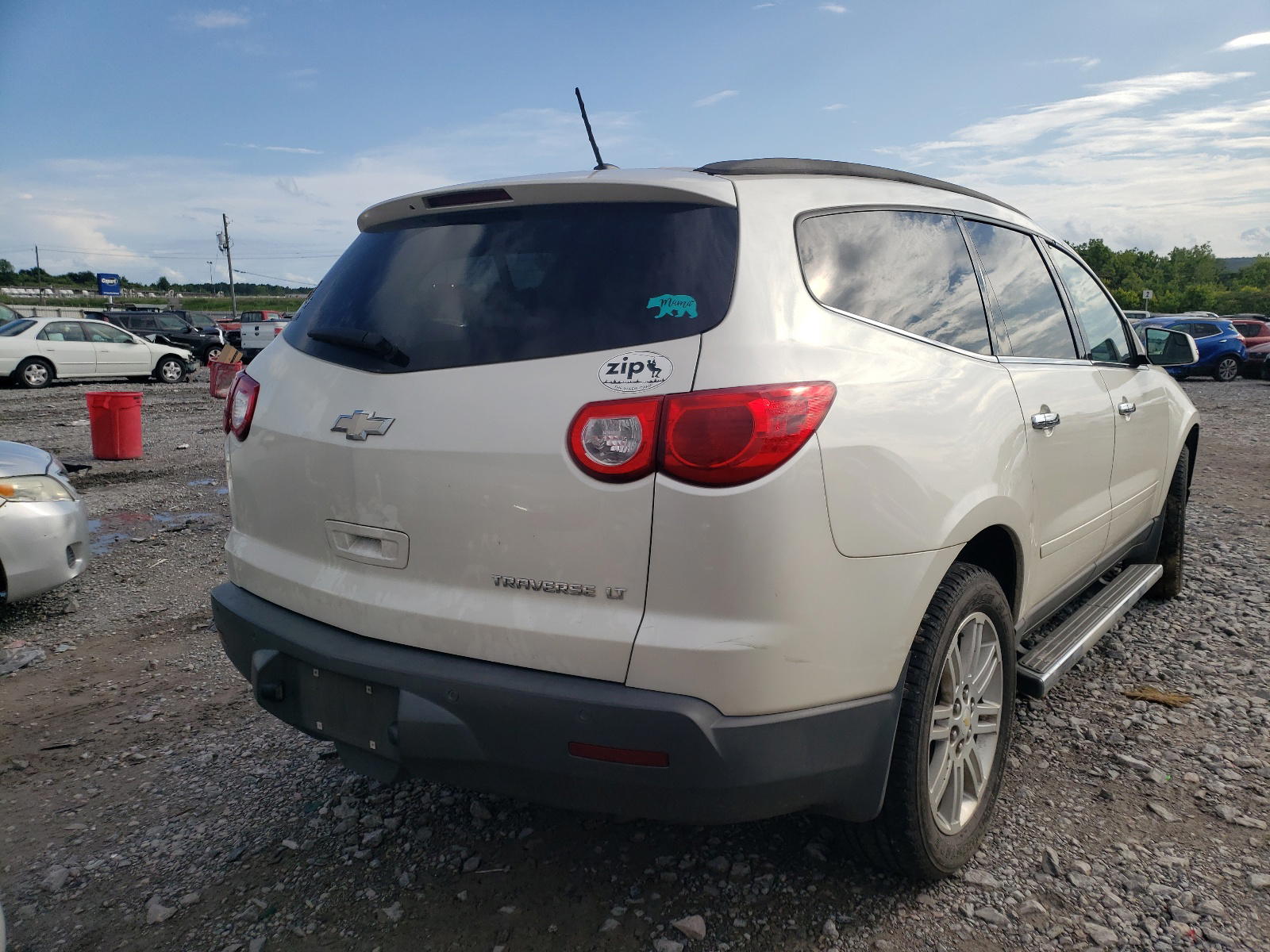 Photo 4 from auction – 2011 CHEVROLET TRAVERSE L with VIN 1GNKRGED5BJ265990