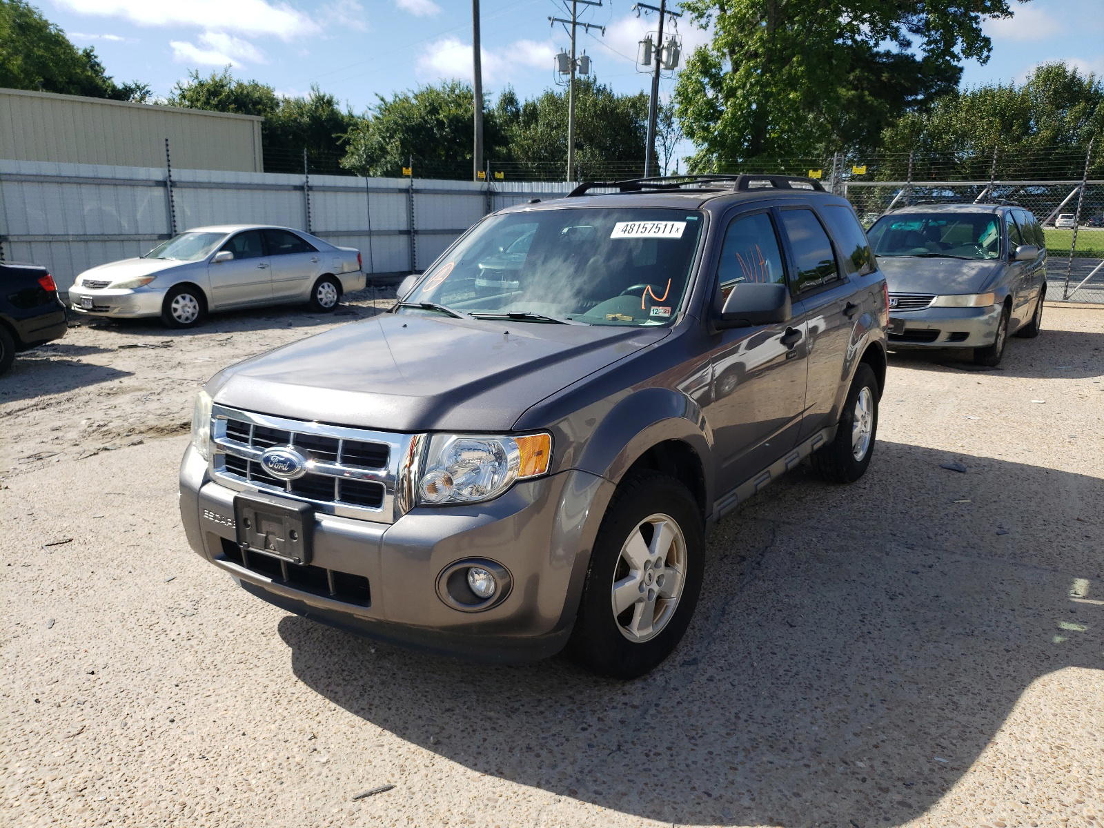 Photo 2 from auction – 2011 FORD ESCAPE XLT with VIN 1FMCU0D79BKA79289