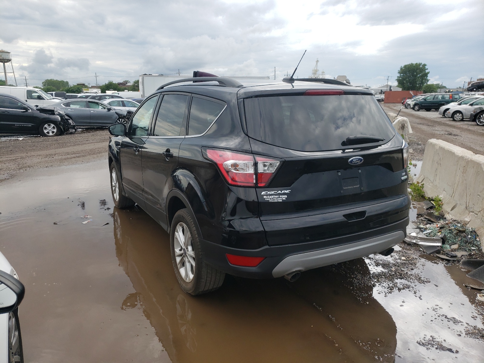 Photo 3 from auction – 2018 FORD ESCAPE SE with VIN 1FMCU0GD3JUA40136