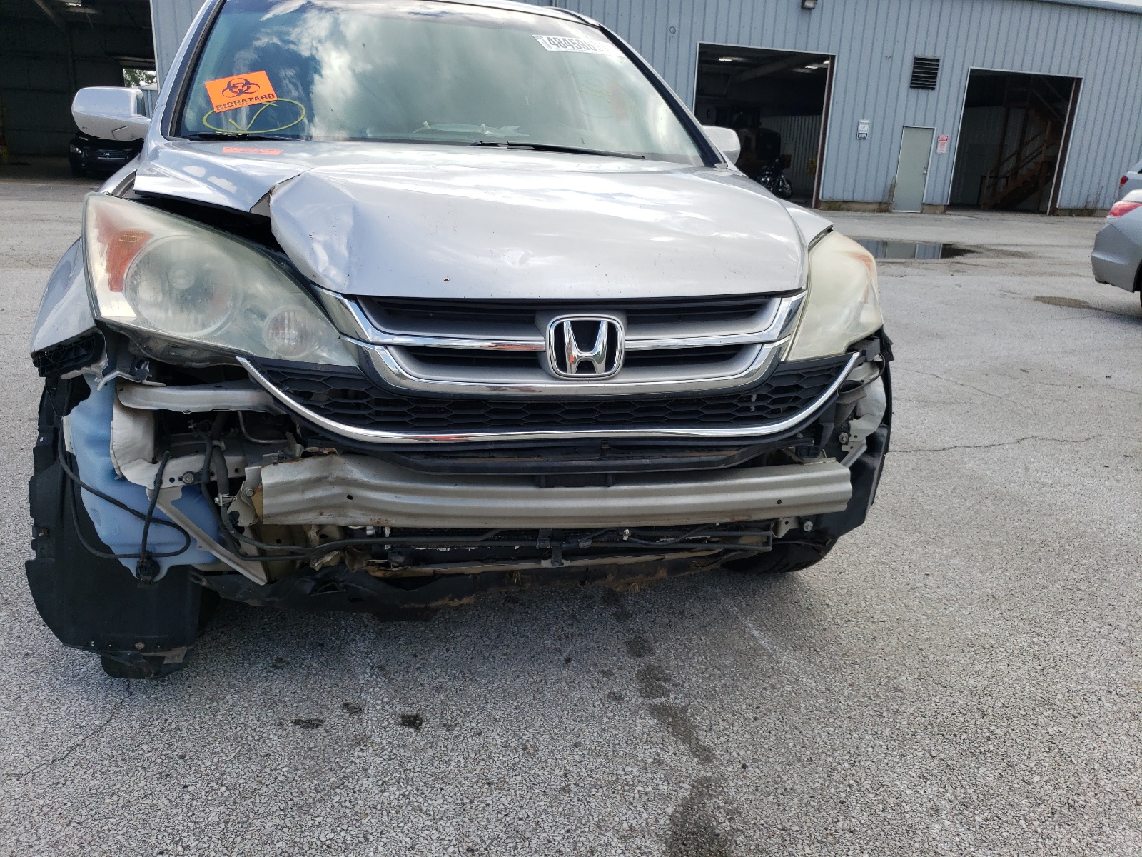 Photo 9 from auction – 2011 HONDA CR-V EXL with VIN 5J6RE4H76BL078070