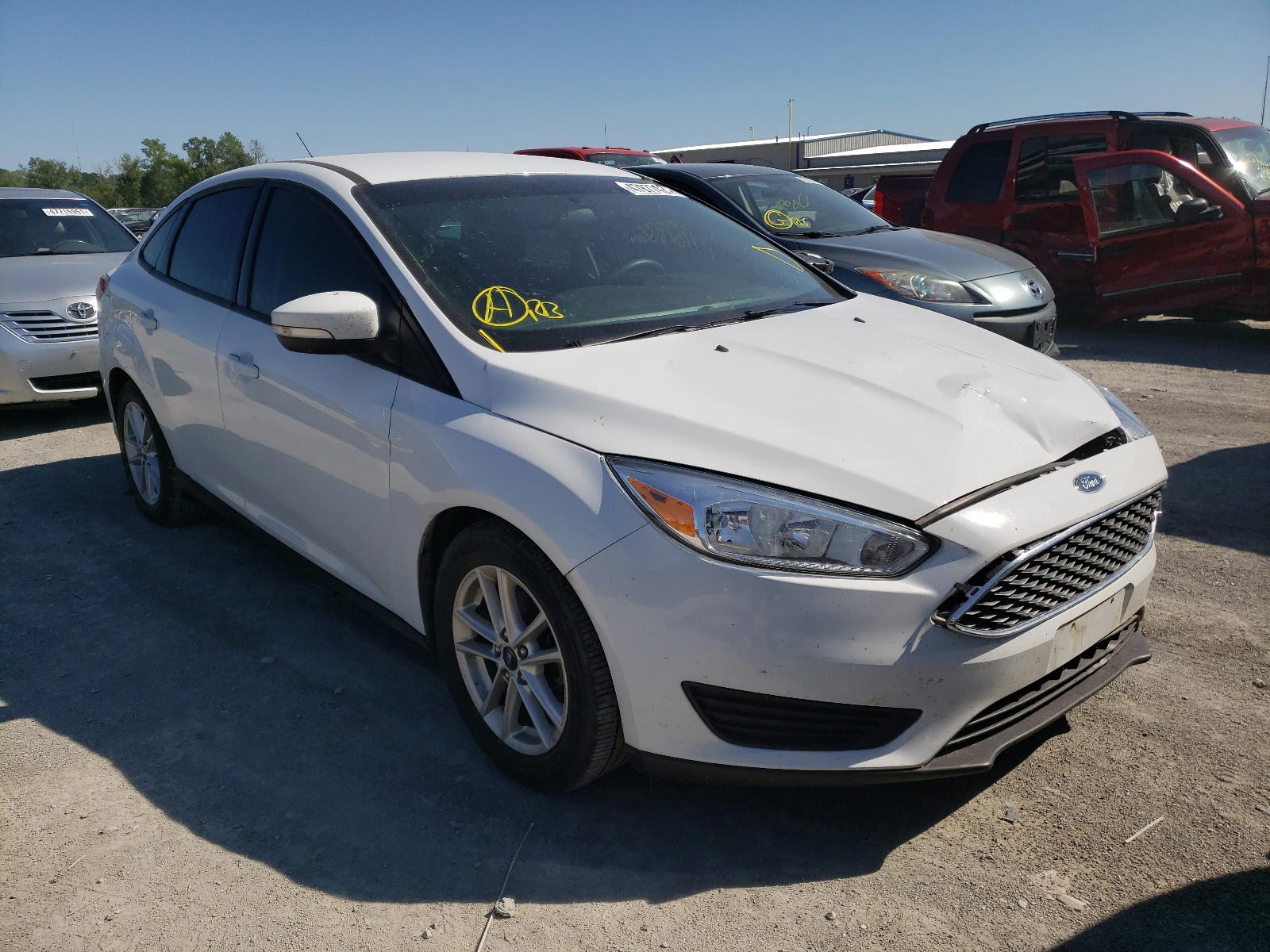 FORD FOCUS SE 2016 with VIN 1FADP3F29GL340835 - Photo from auction