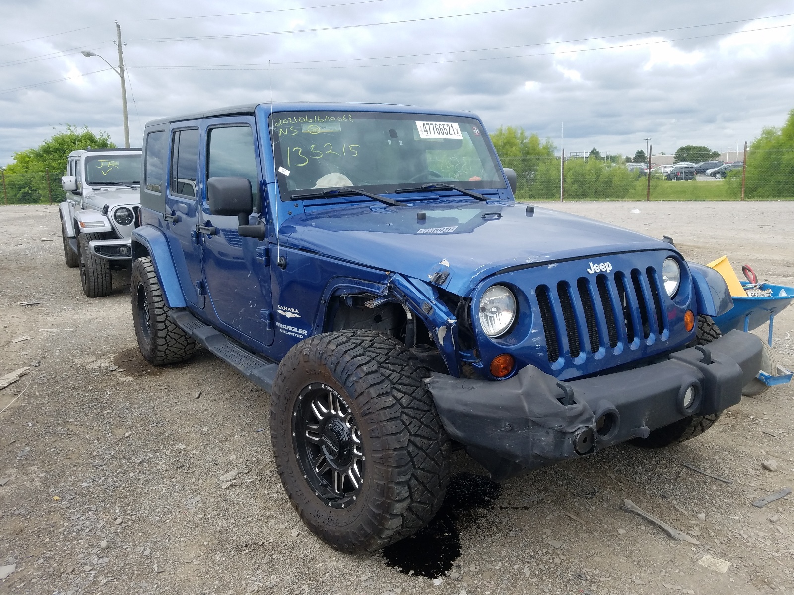 JEEP WRANGLER U 2010 with VIN 1J4BA5H10AL135215 - Photo from auction
