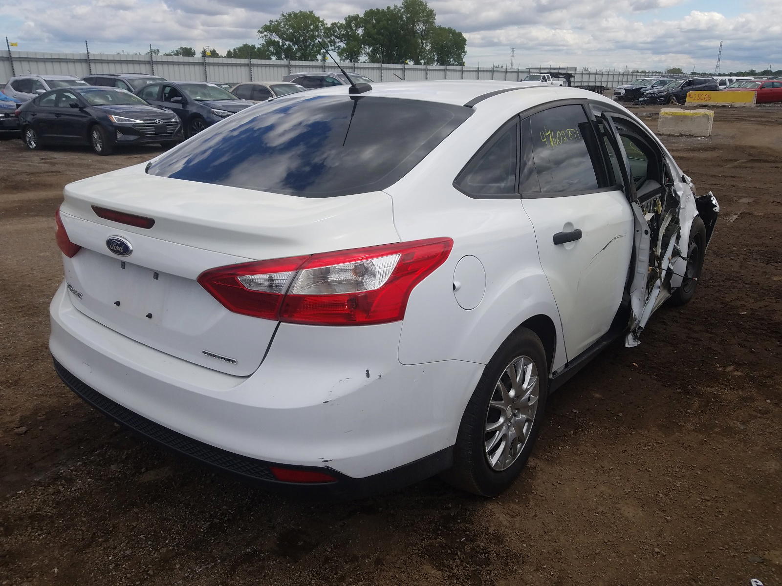 Photo 4 from auction – 2013 FORD FOCUS S with VIN 1FADP3E22DL370403