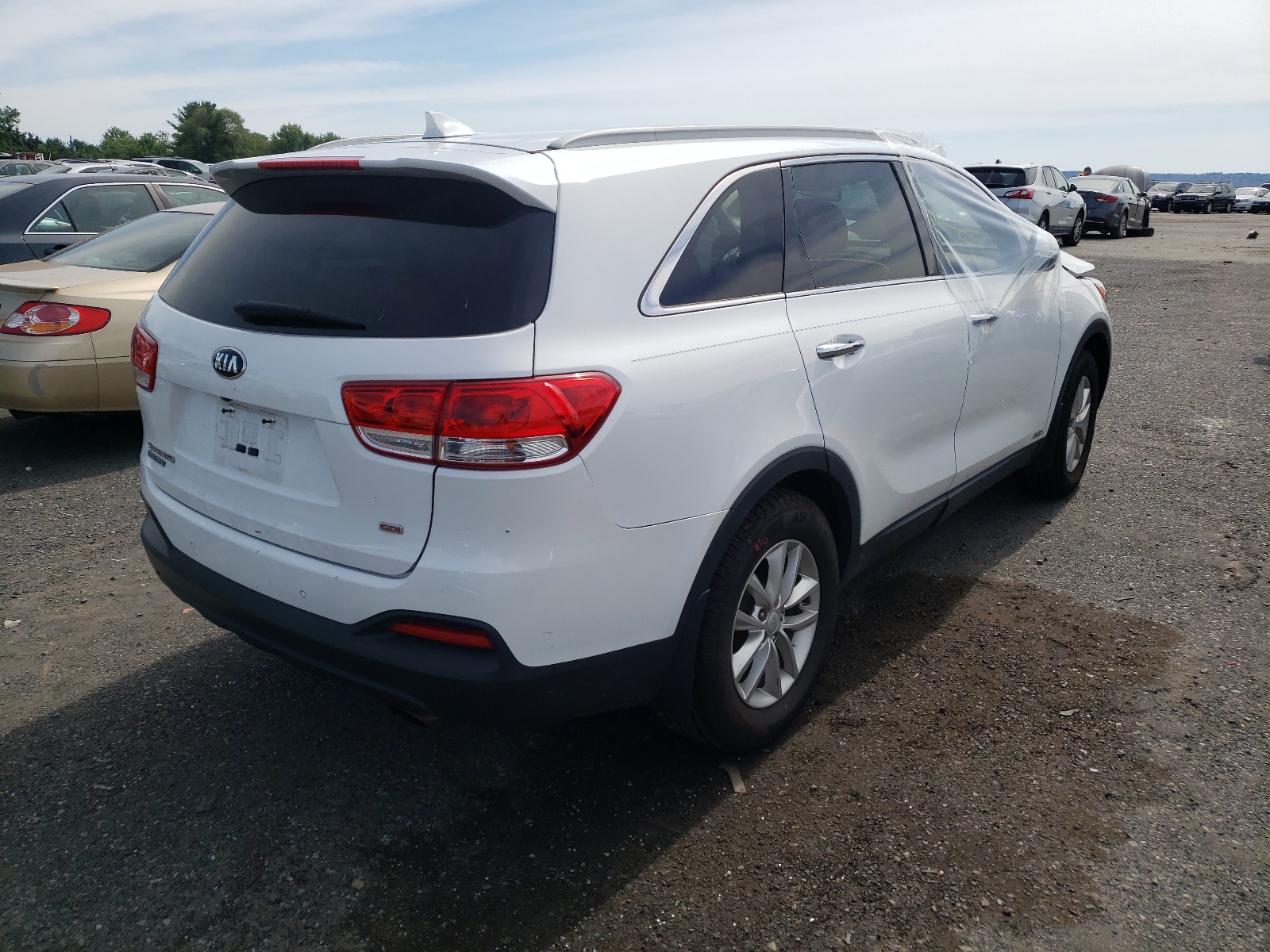 Photo 4 from auction – 2018 KIA SORENTO LX with VIN 5XYPGDA36JG414244